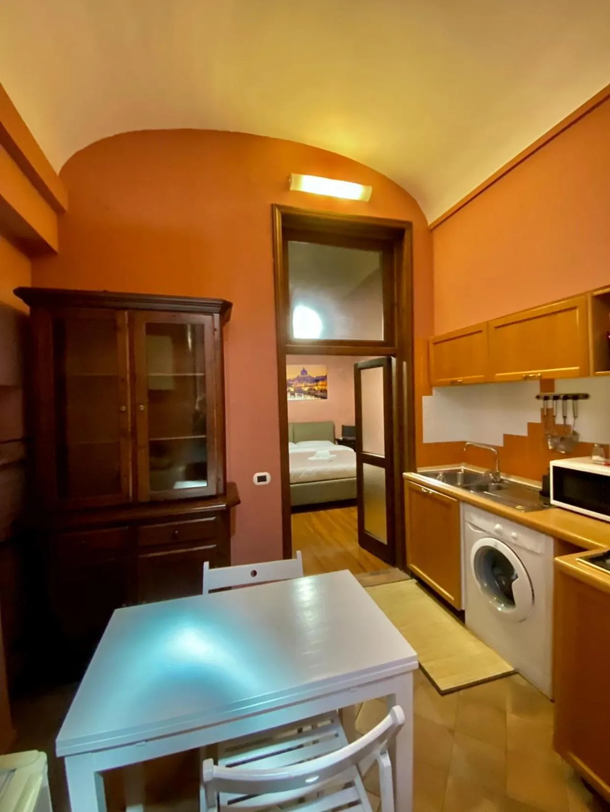 Kitchen or kitchenette, Bed in Borgo Pio 91