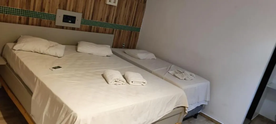 Bed in Hotel Cajuína City