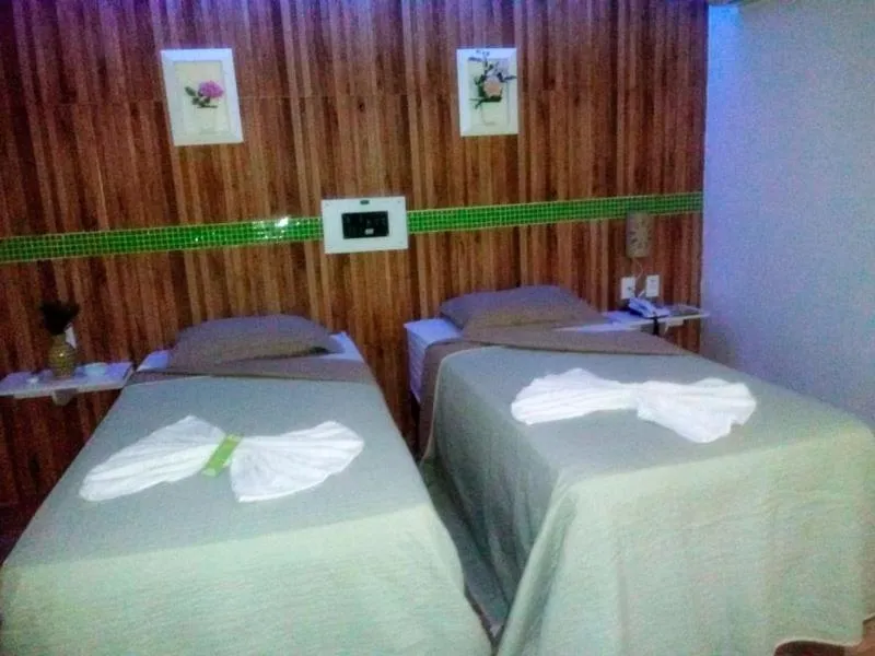 Bed in Hotel Cajuína City