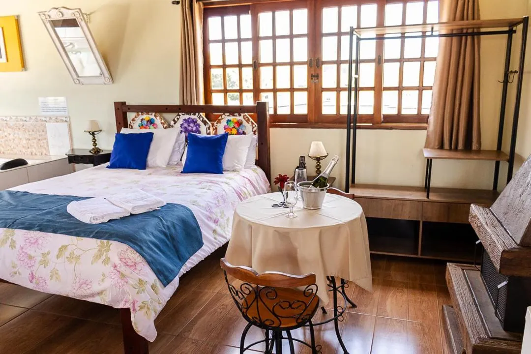 Bed in Pousada Chalés São Francisco