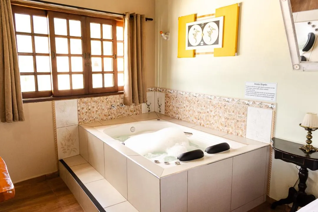 Hot Tub in Pousada Chalés São Francisco