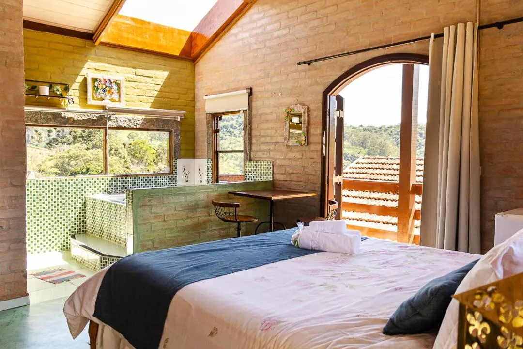 Bed in Pousada Chalés São Francisco