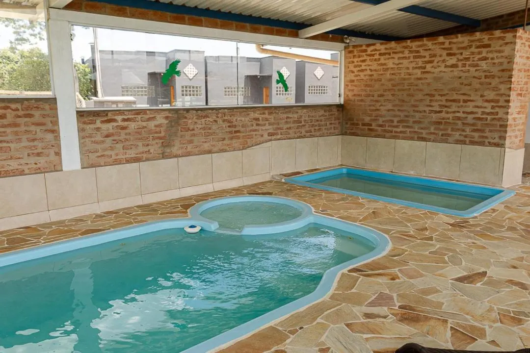 Swimming pool in Pousada Chalés São Francisco