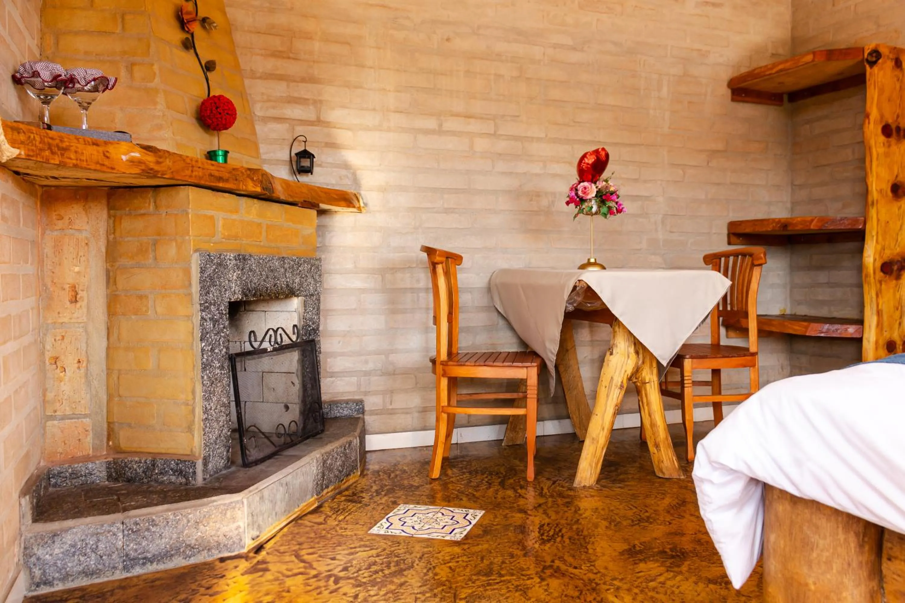 Seating area in Pousada Chalés São Francisco