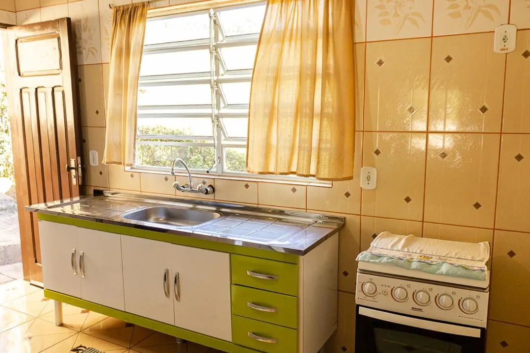 Kitchen or kitchenette in Pousada Chalés São Francisco