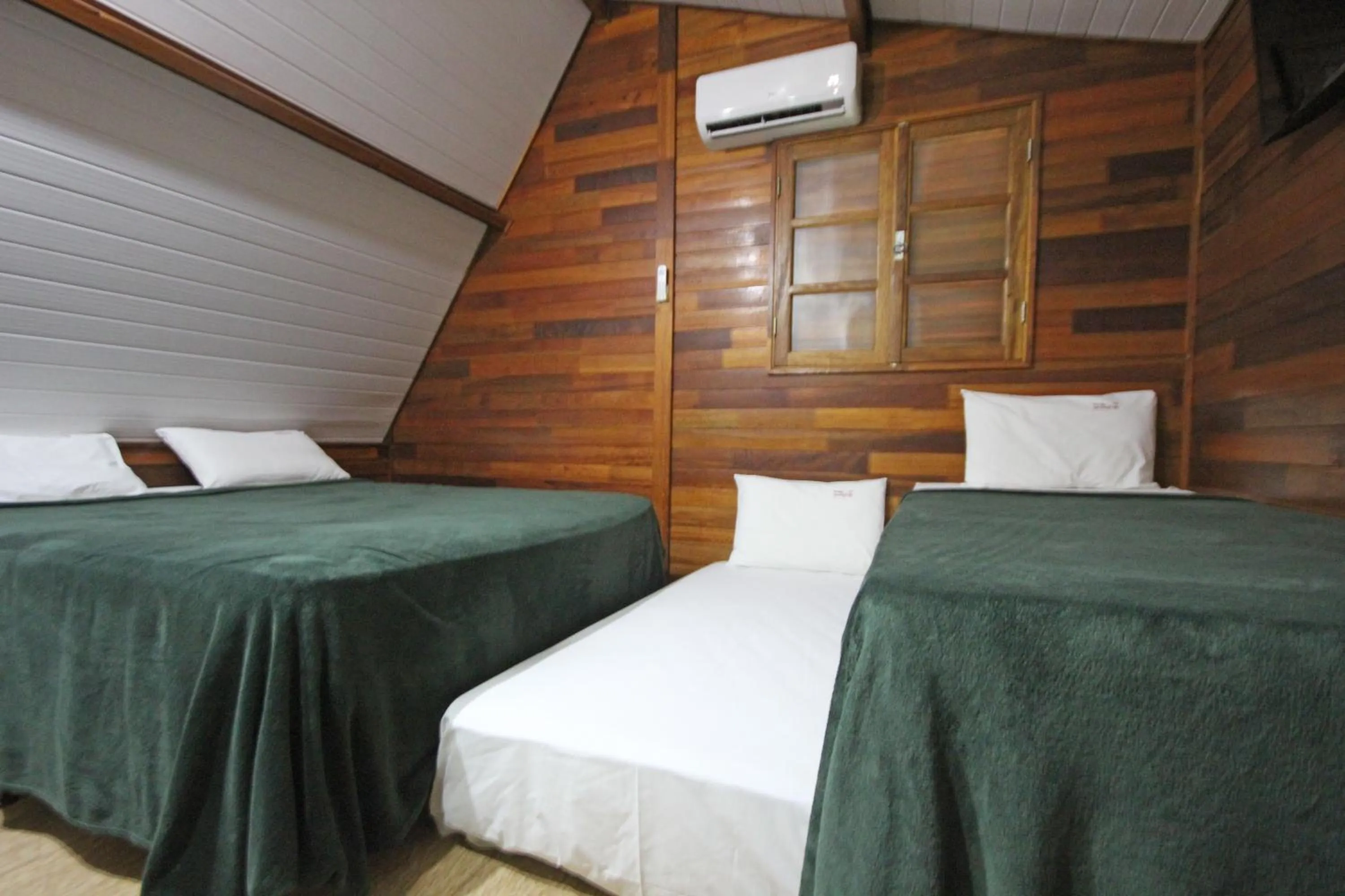 Bed in Monte Carlo Pousada