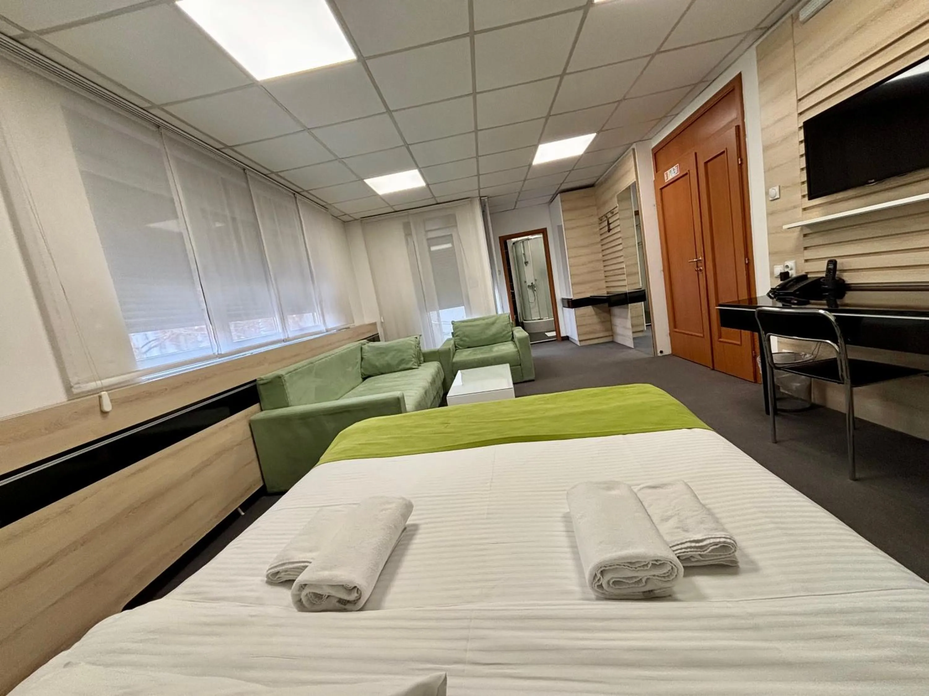 Bed in Garni Hotel Consul