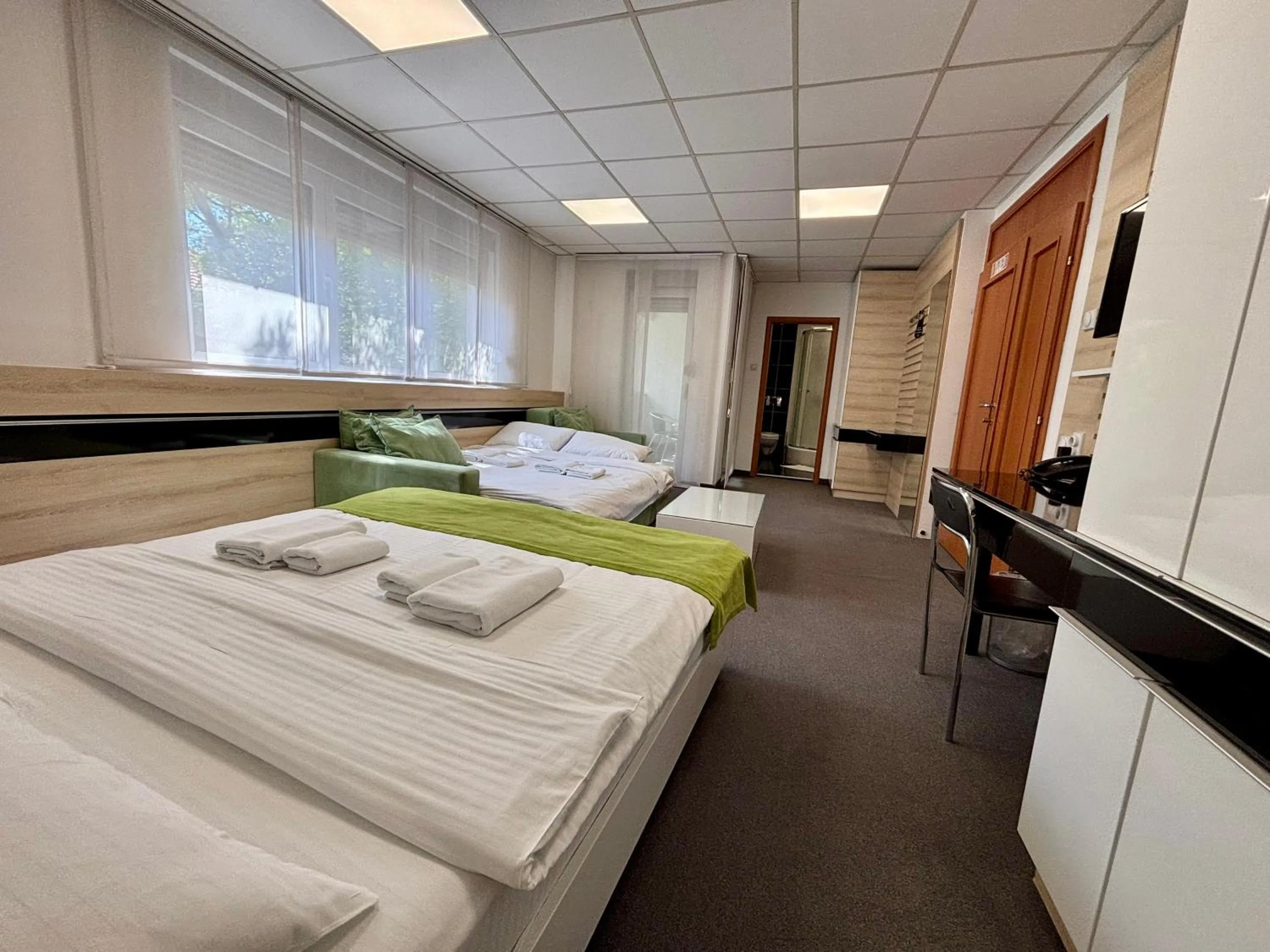 Bed in Garni Hotel Consul