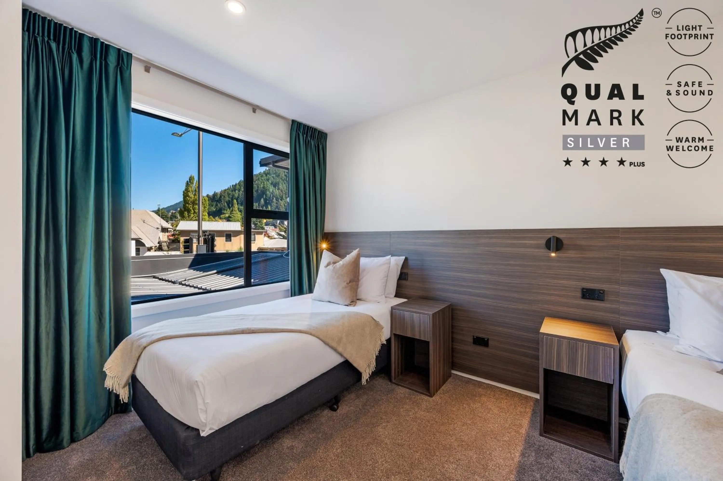 Bed in Luxe Suites & Apartments