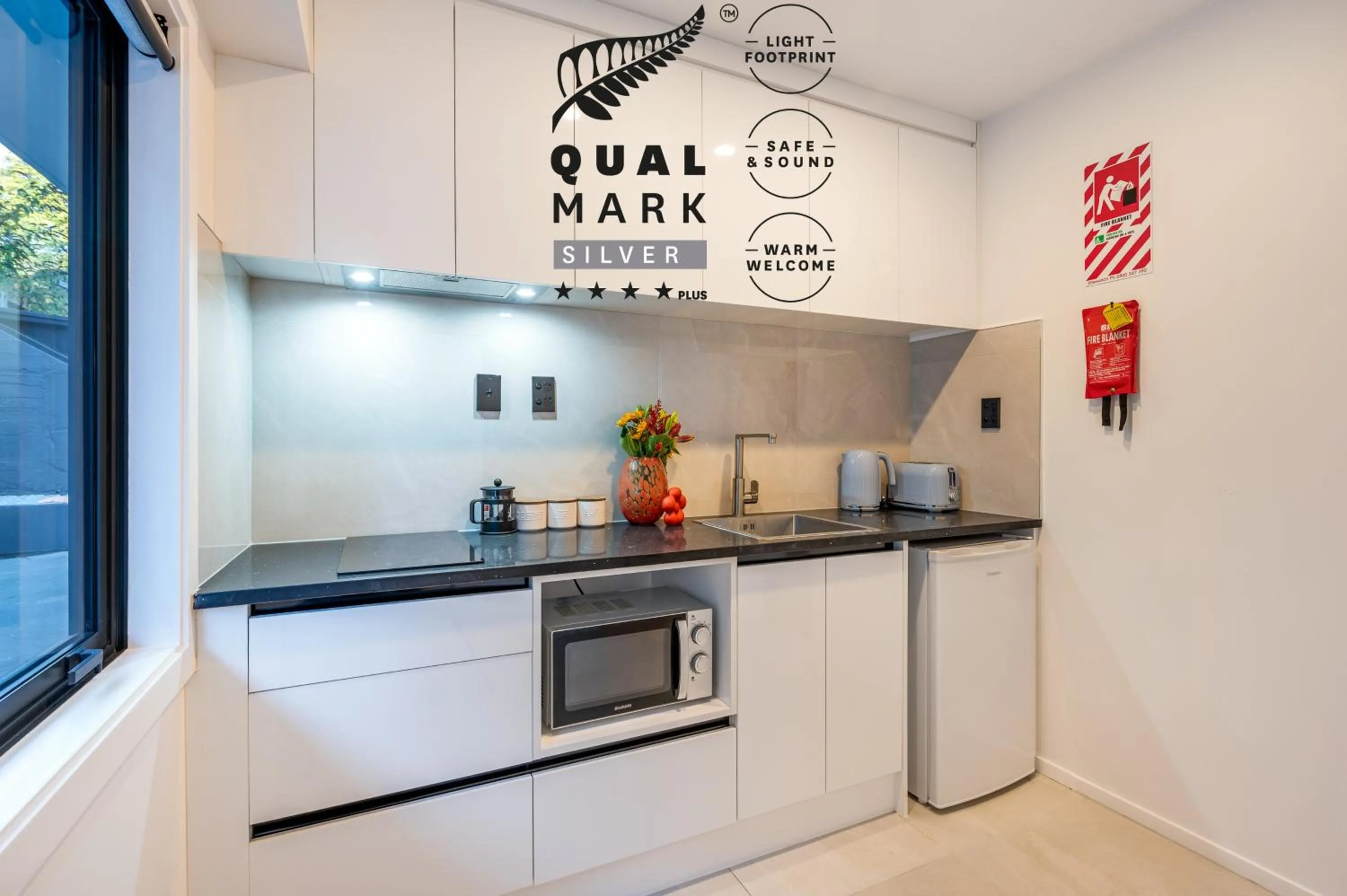 kitchen in Luxe Suites & Apartments