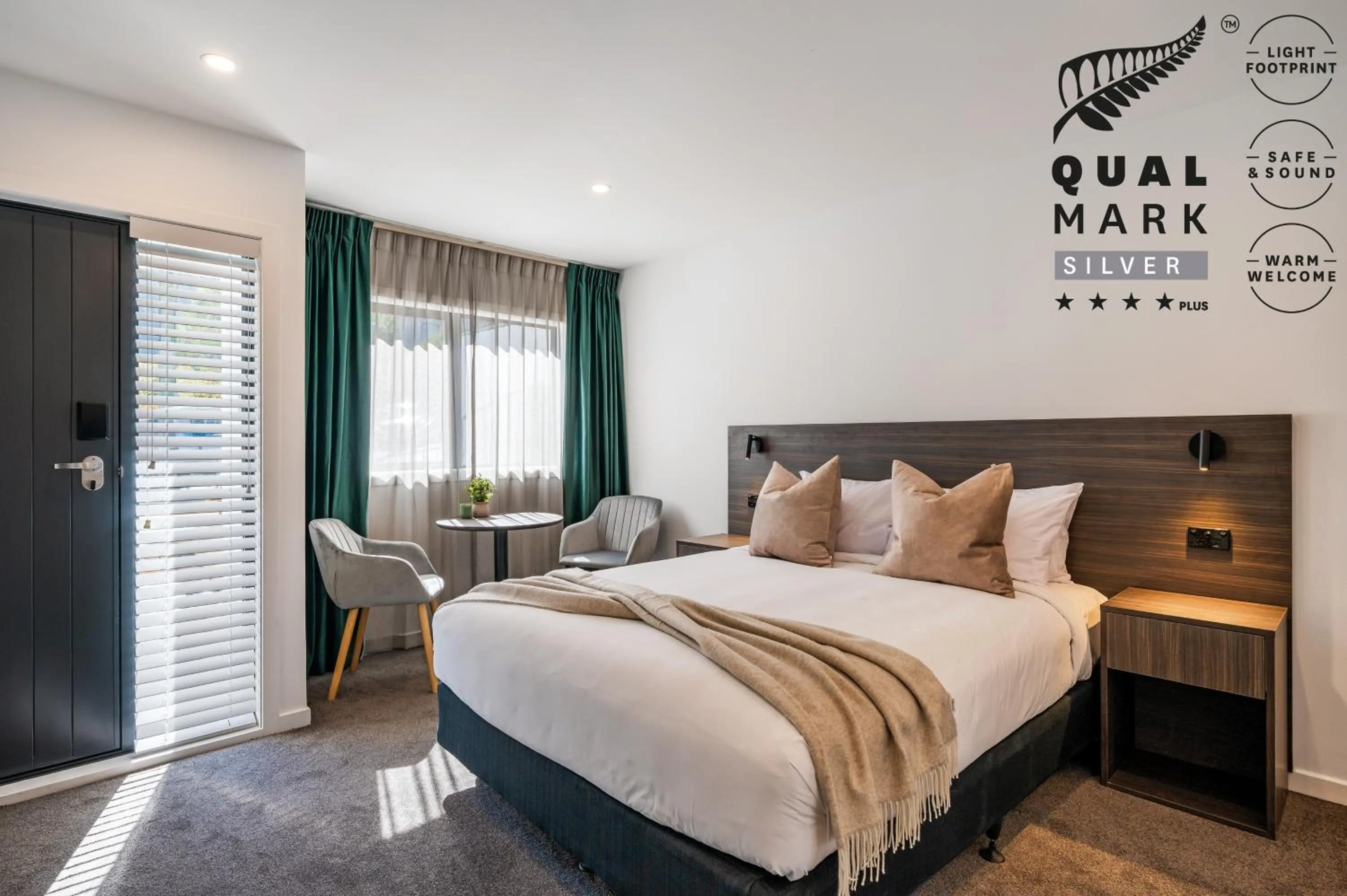 Bed in Luxe Suites & Apartments