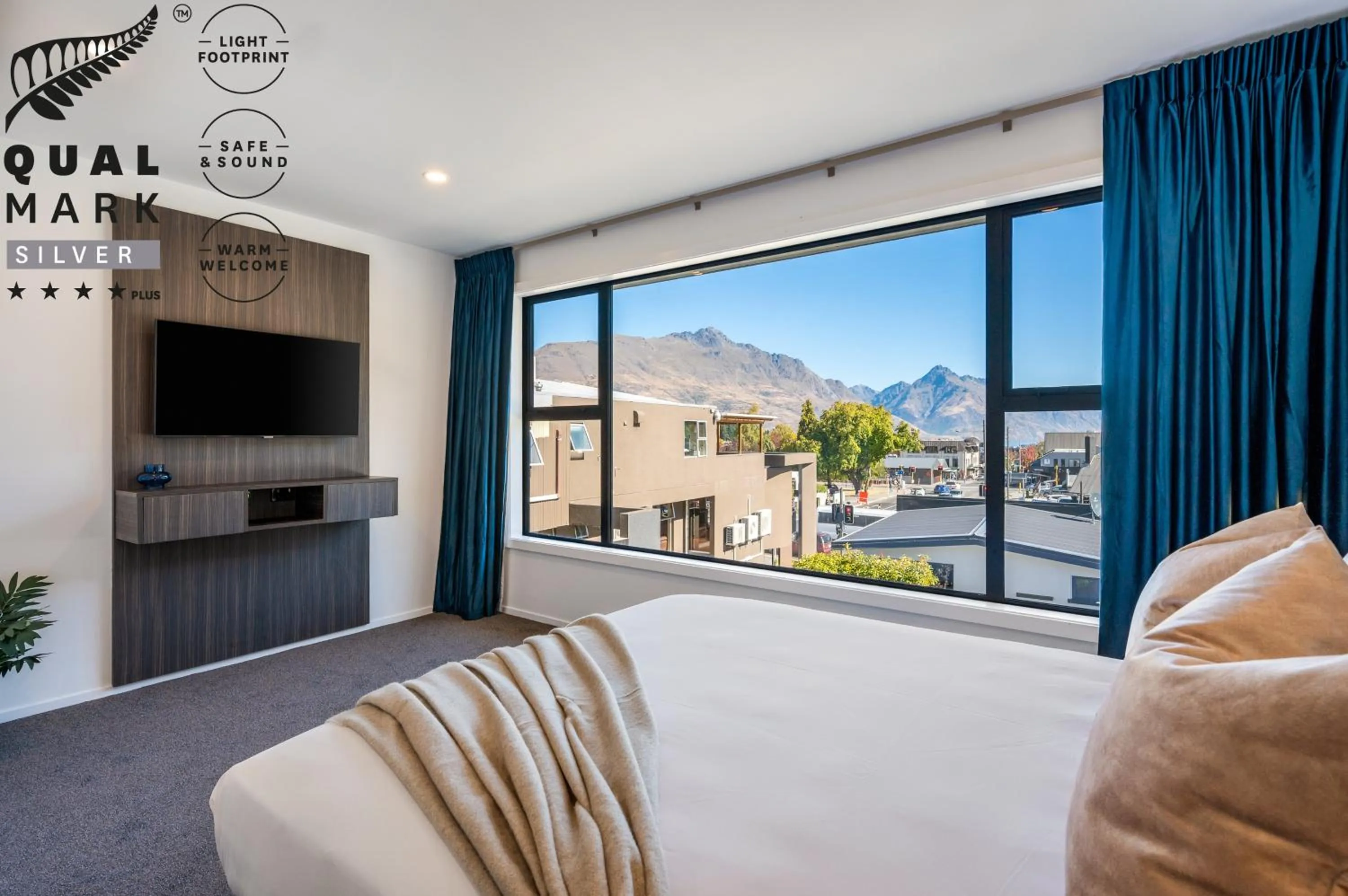 Bed in Luxe Suites & Apartments