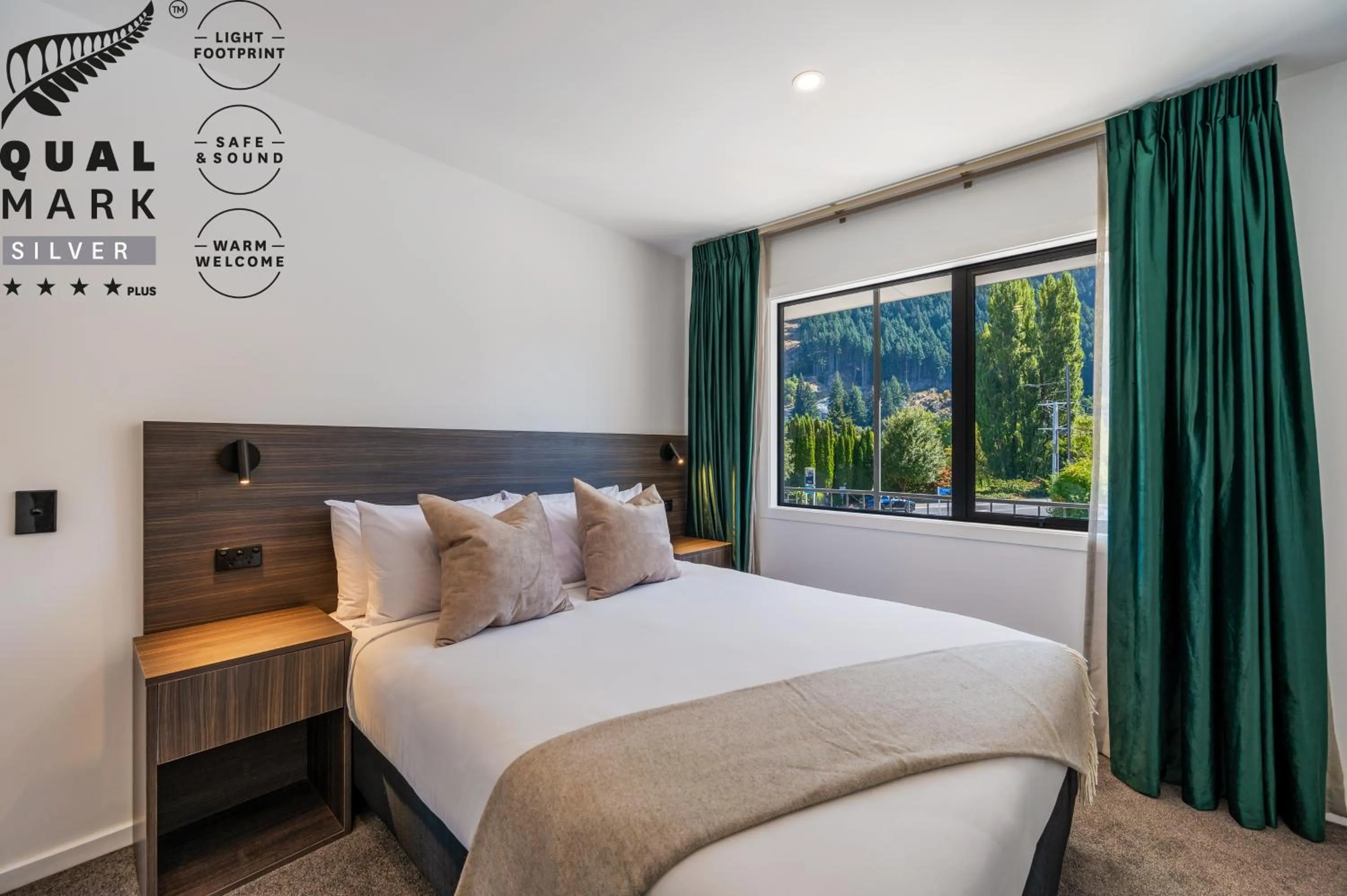 Bed in Luxe Suites & Apartments