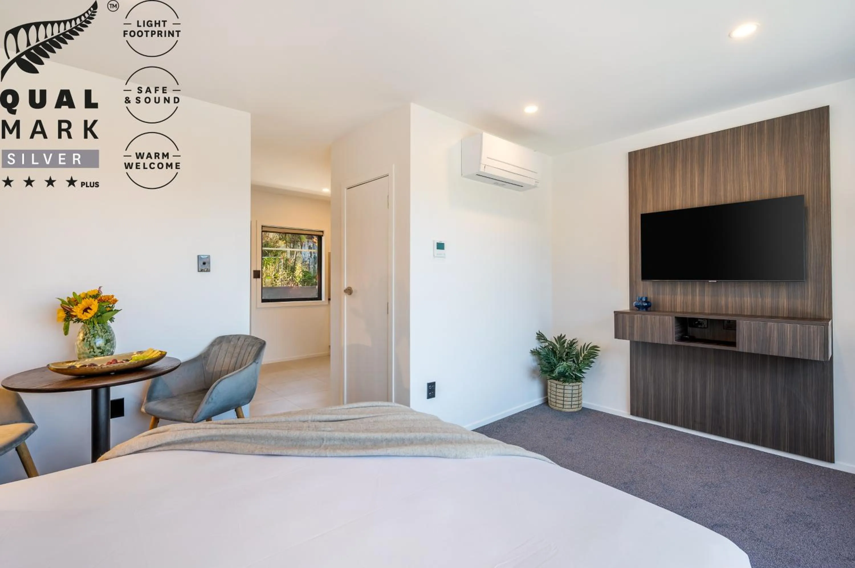 Bed in Luxe Suites & Apartments