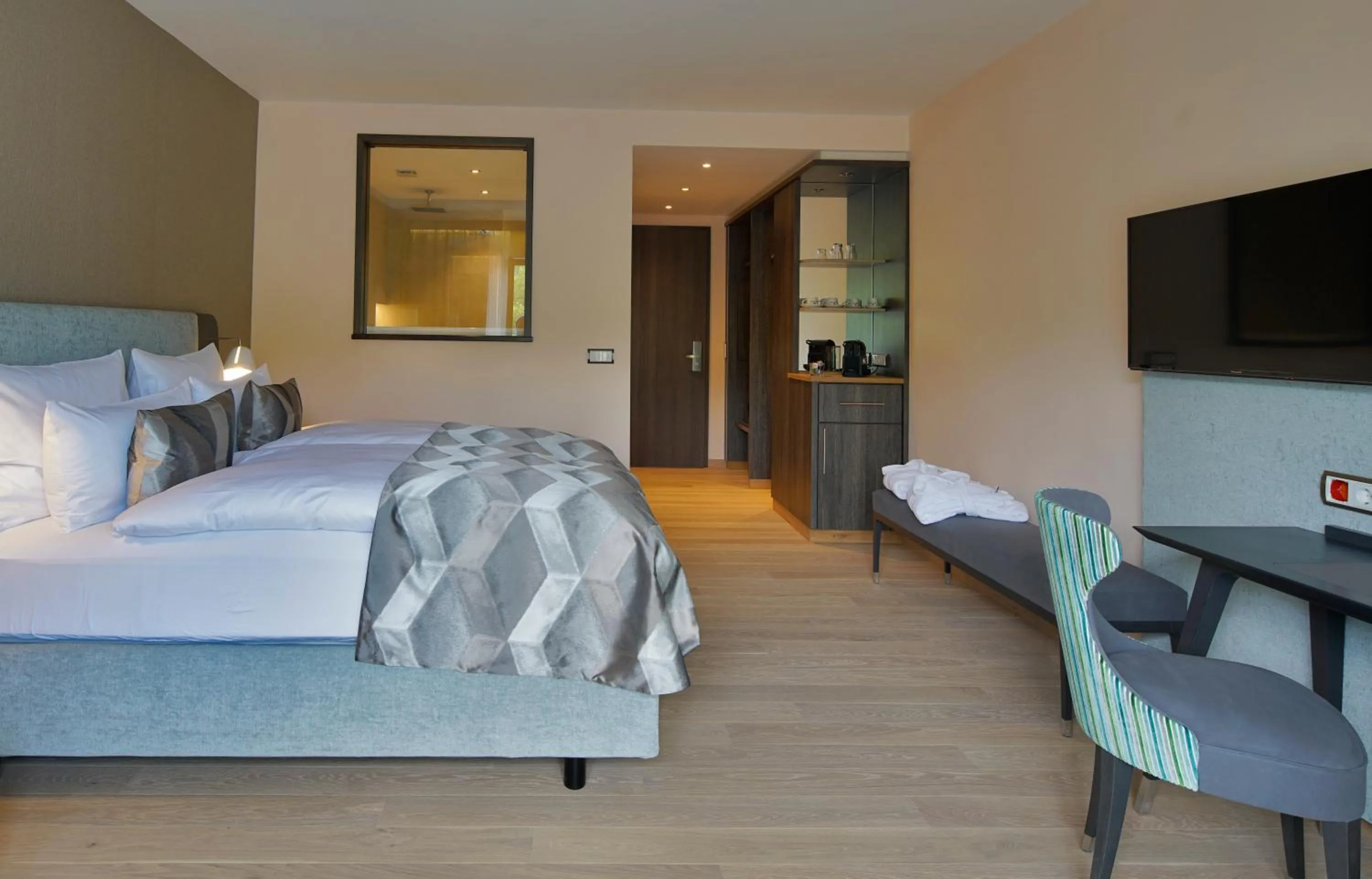 Bed in Essensio Hotel Düsseldorf