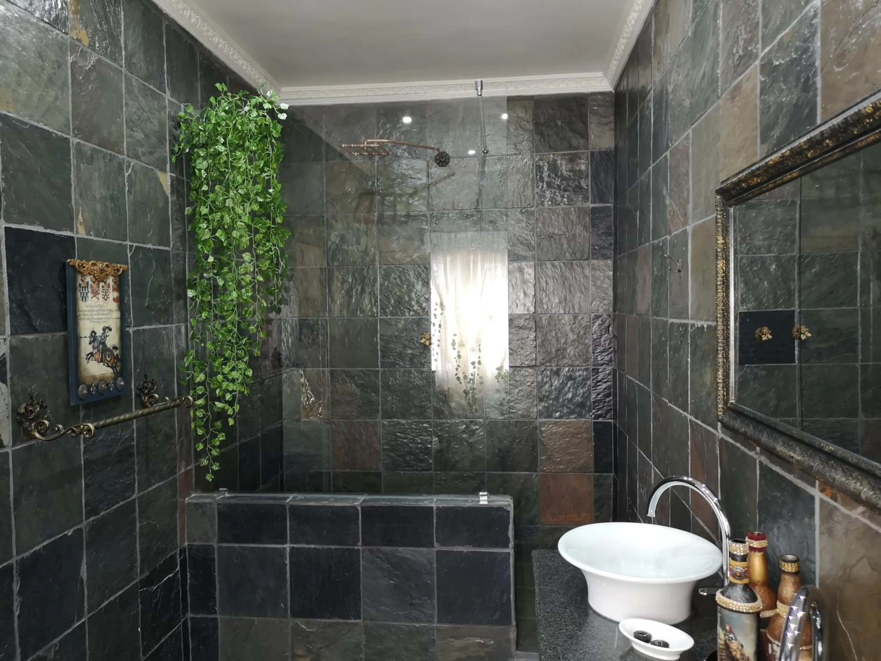 Bathroom in Excalibur Boutique Hotel