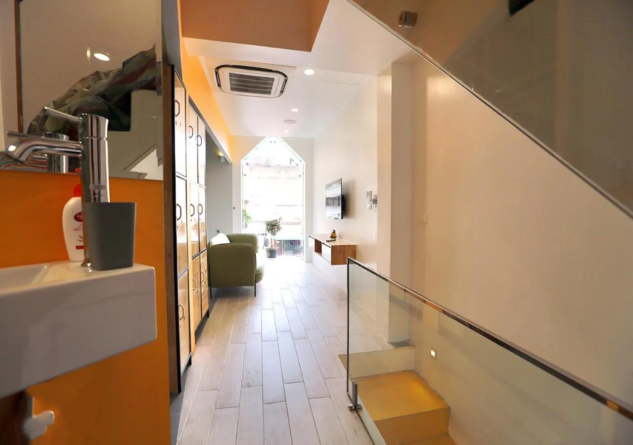 Communal lounge/ TV room in Hanoi Banana Hostel