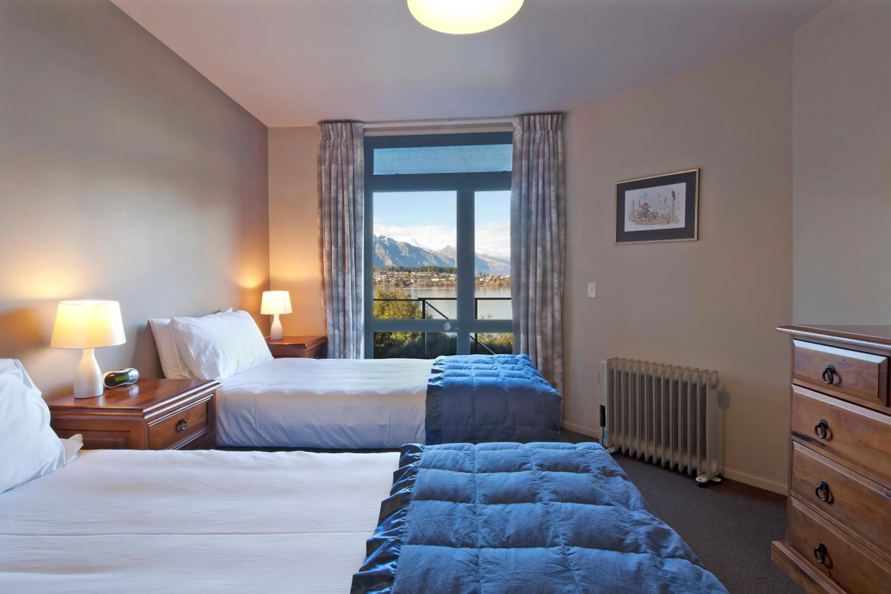 Bed in Spinnaker Bay Apartments