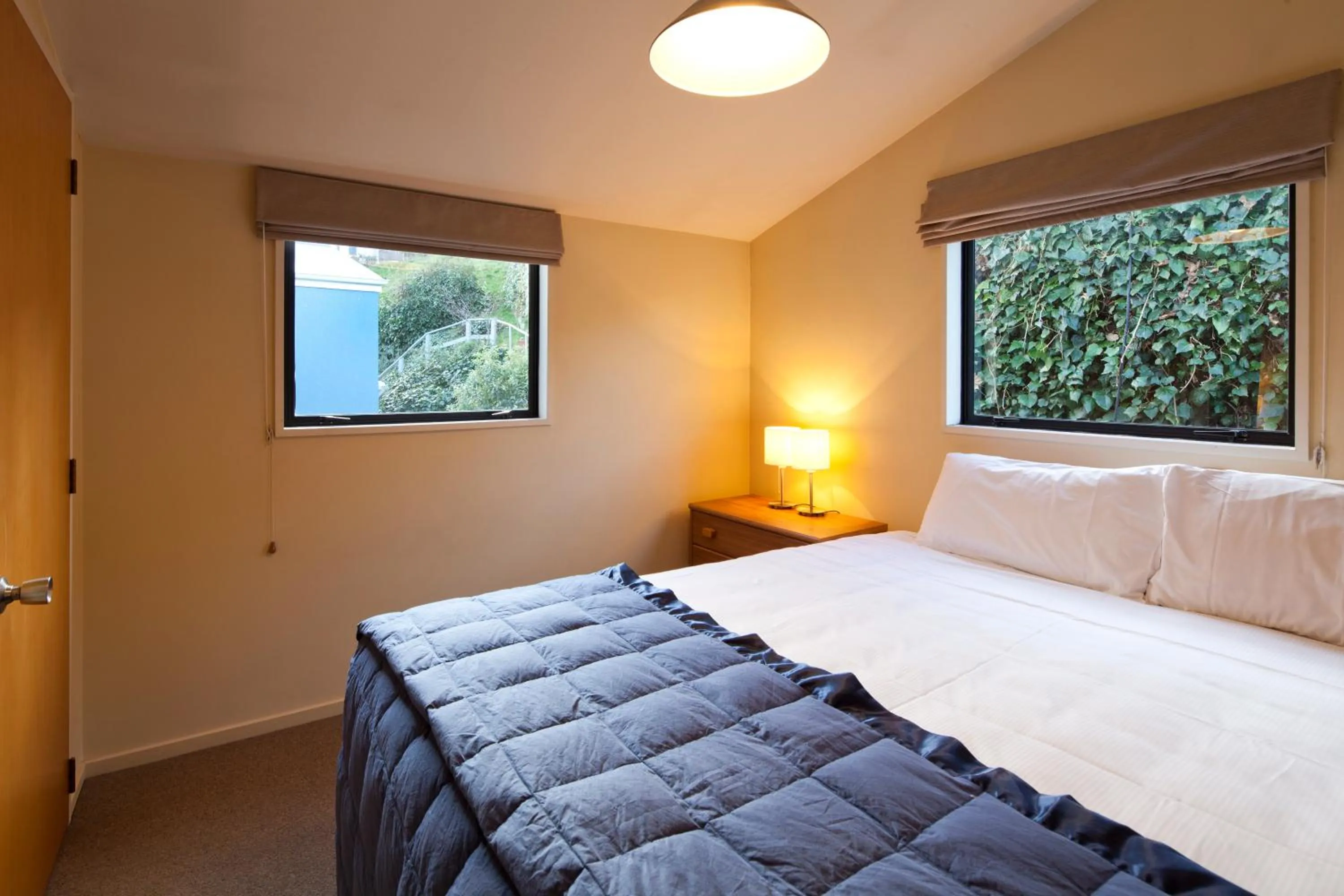 Bed in Spinnaker Bay Apartments