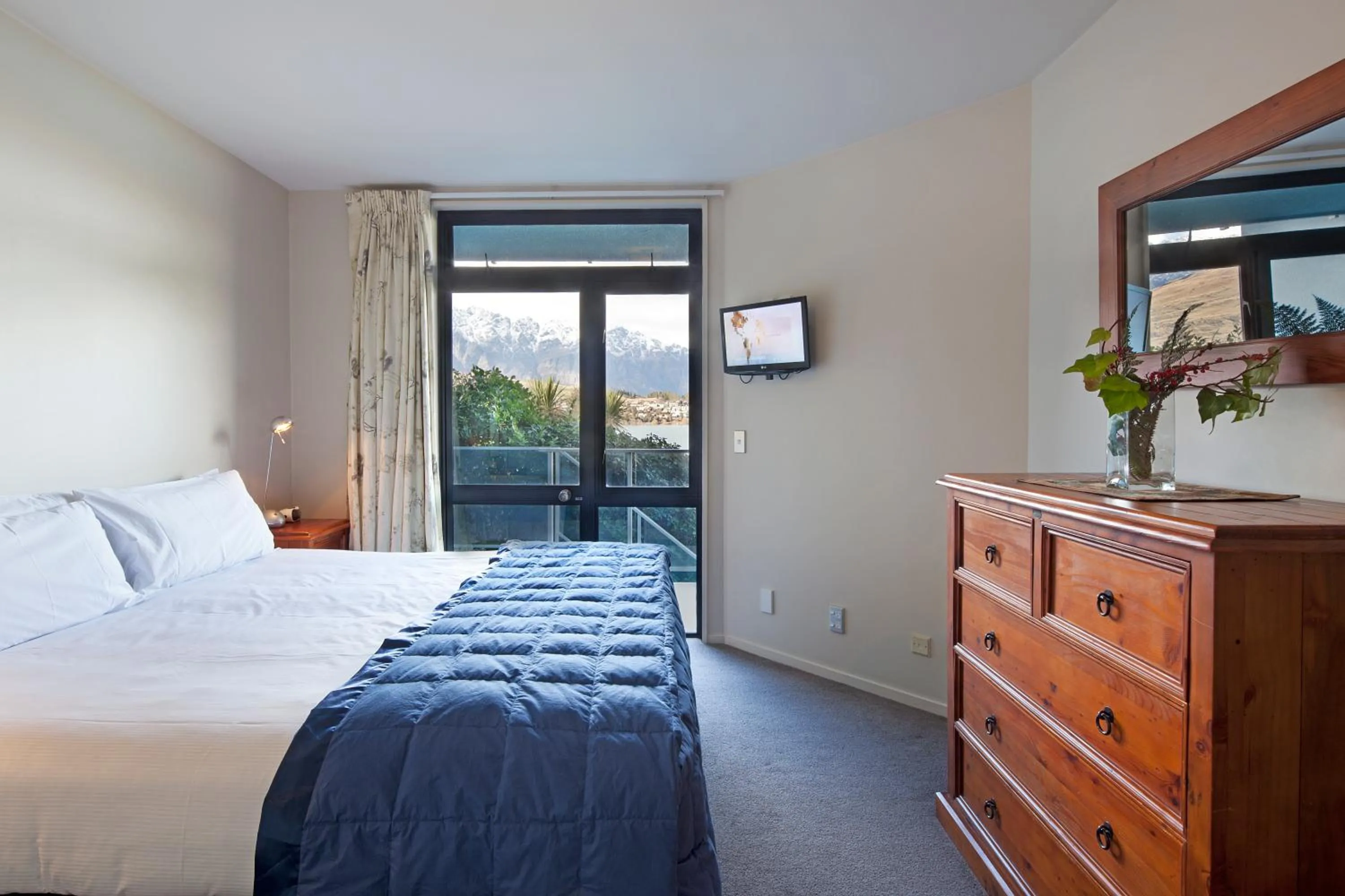 Bed in Spinnaker Bay Apartments