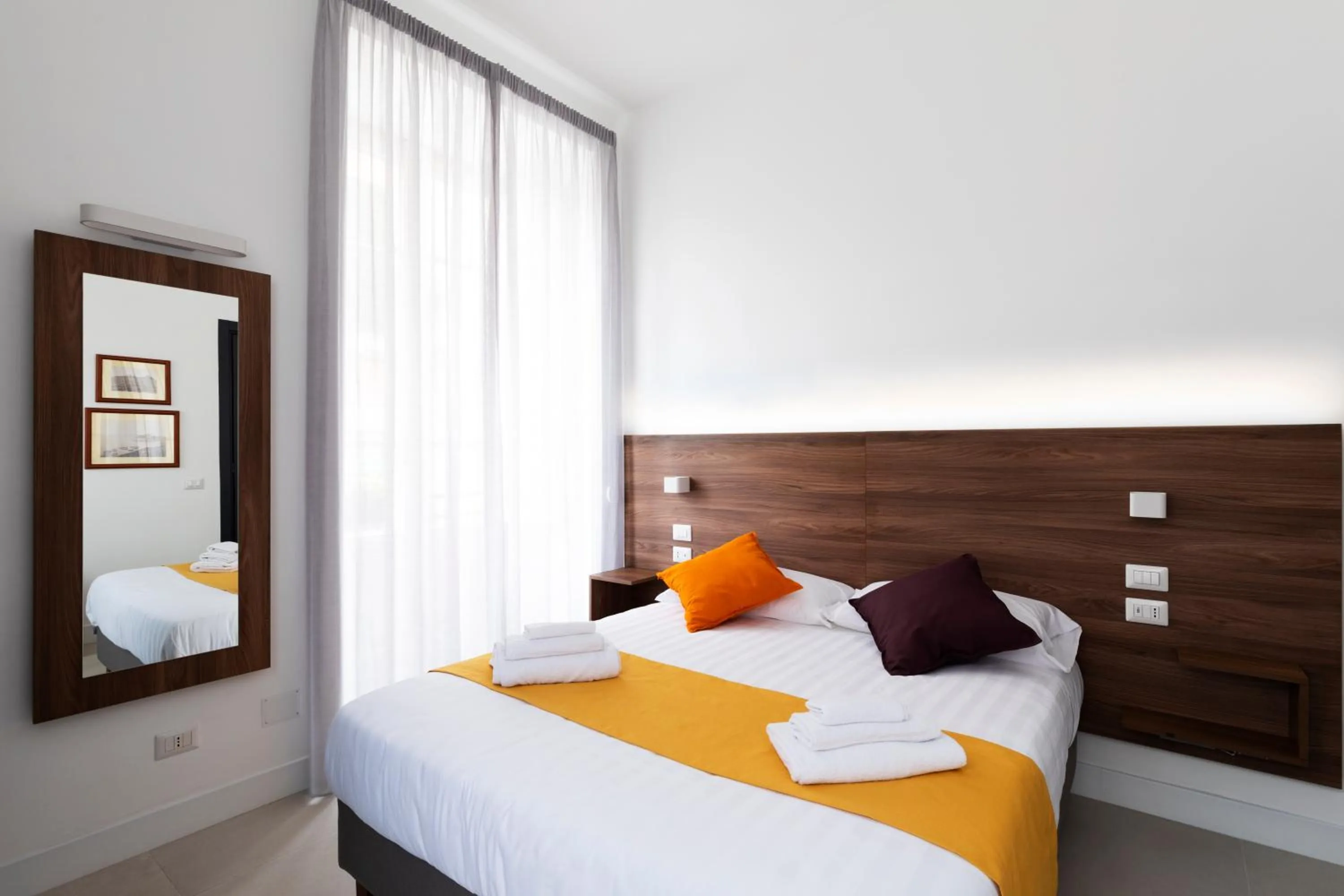 Bed in Acate81 Lifestyle Apartment