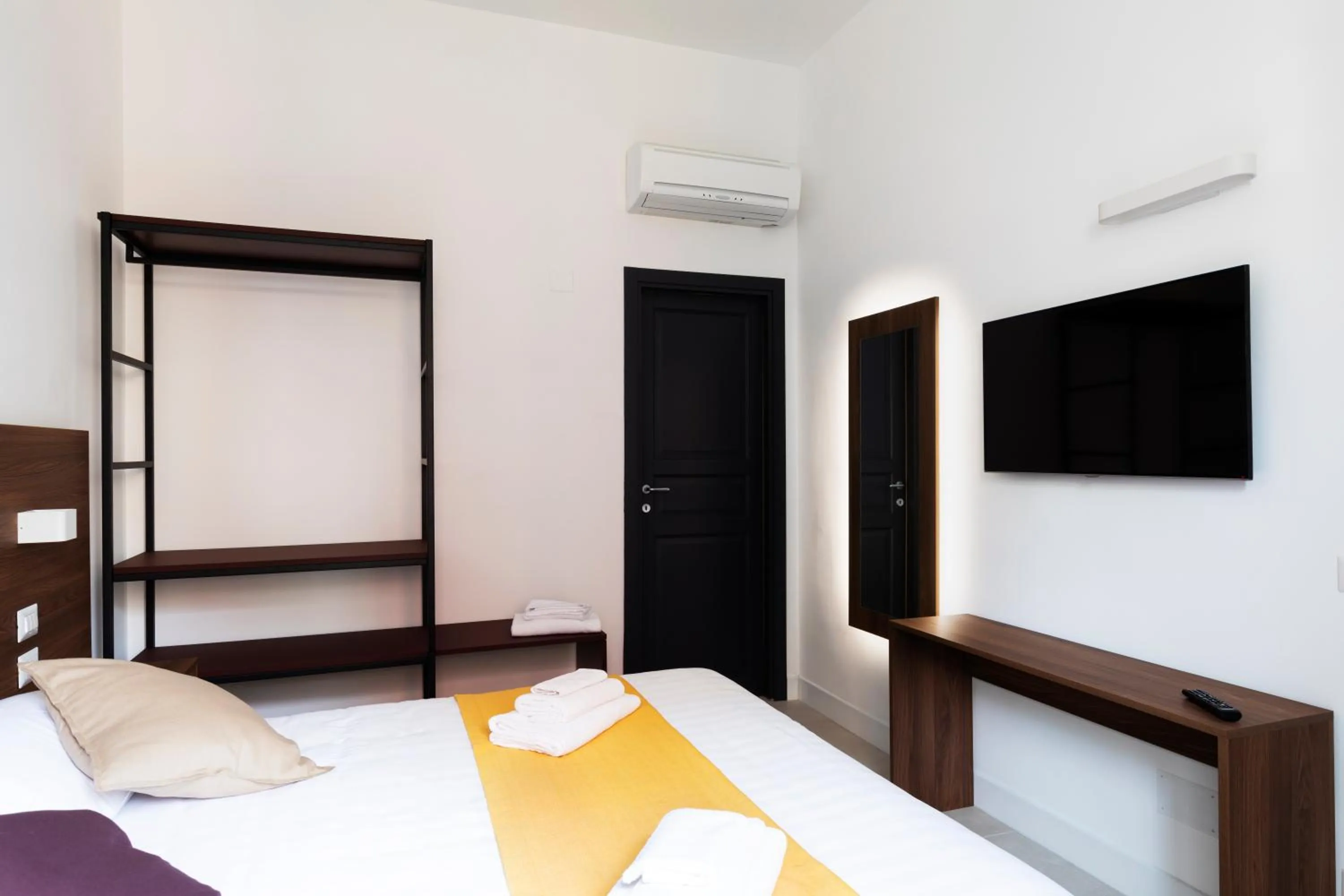 Bed in Acate81 Lifestyle Apartment