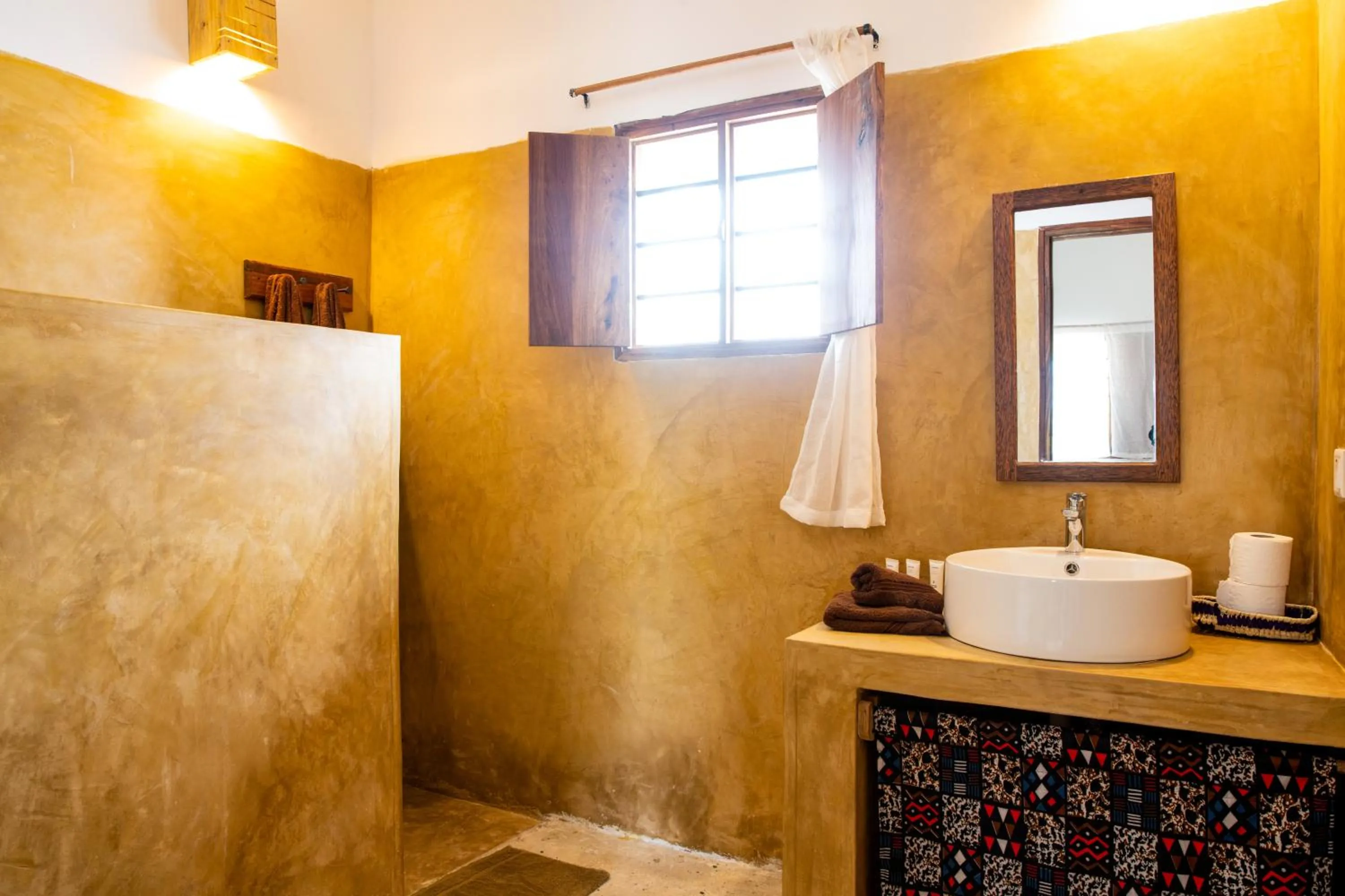 Shower in Nyumbani Residence Suites