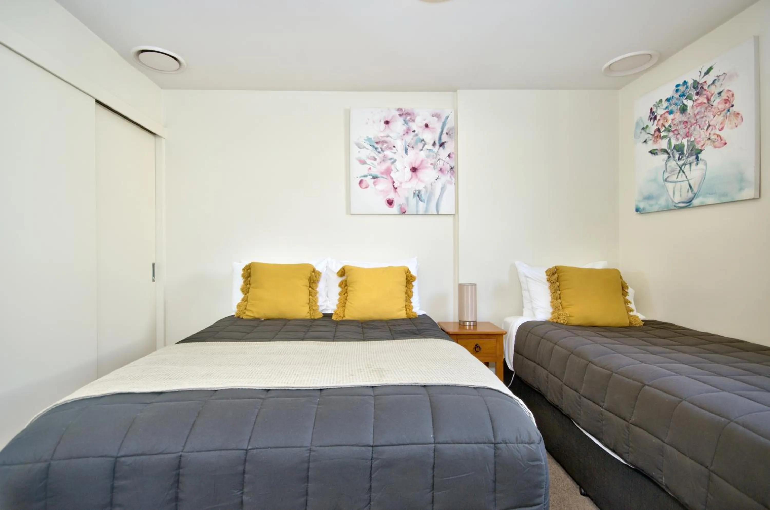 Bed in The Whistler Holiday Apartments