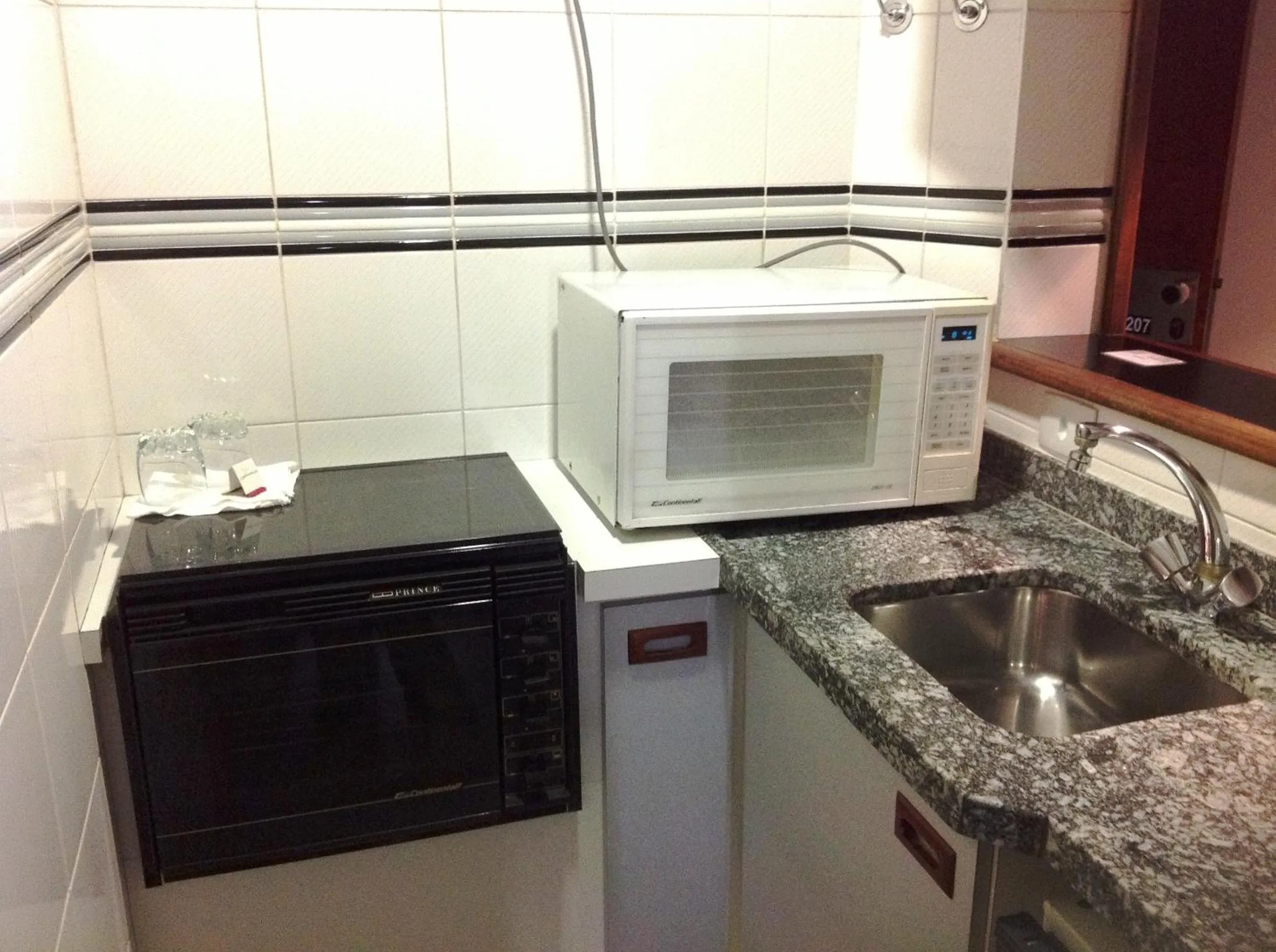 Kitchen or kitchenette in L'Hirondelle Flat Service