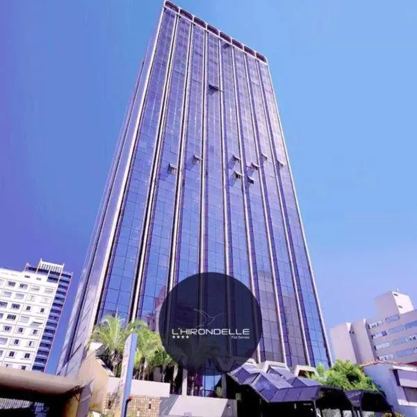 Property building in L'Hirondelle Flat Service