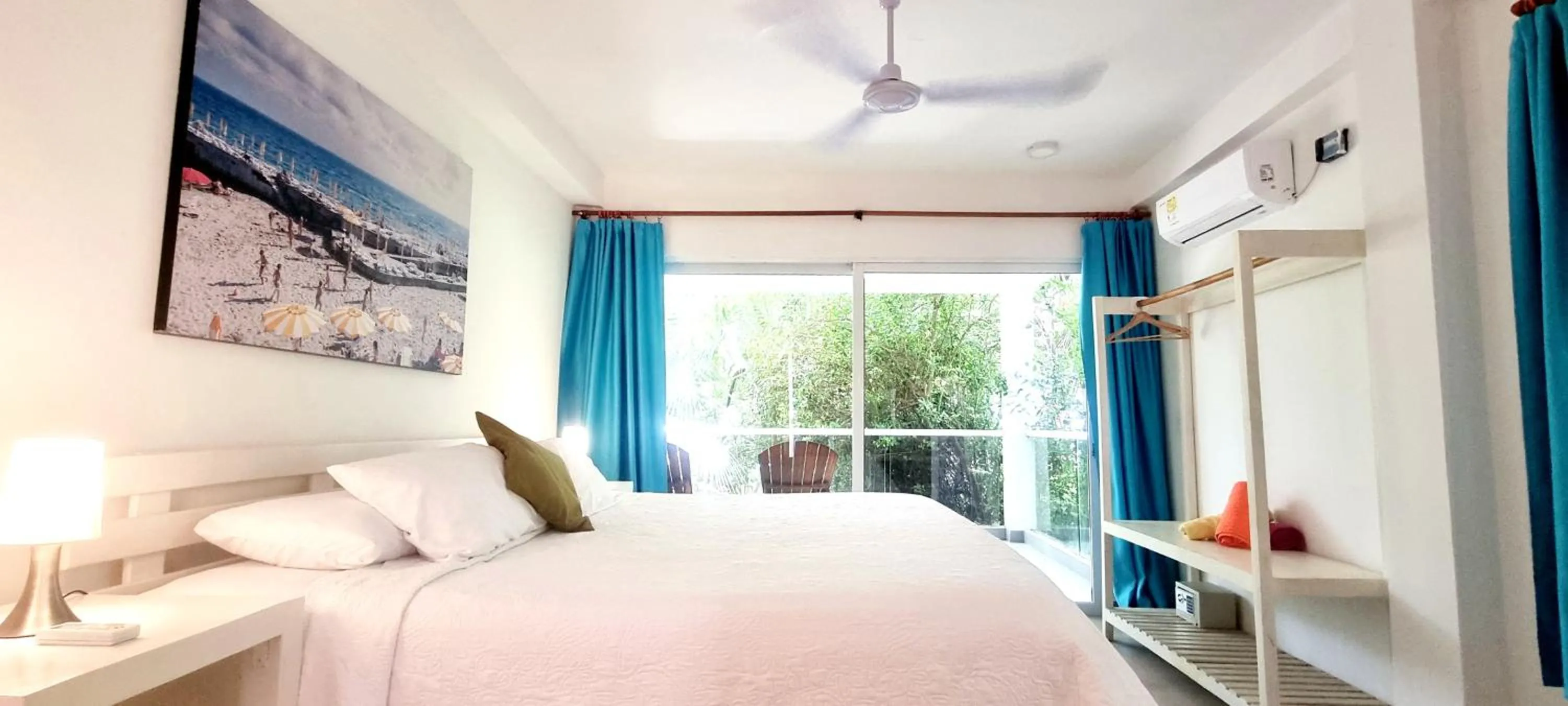 Bed in Blue Mango Beach Hotel