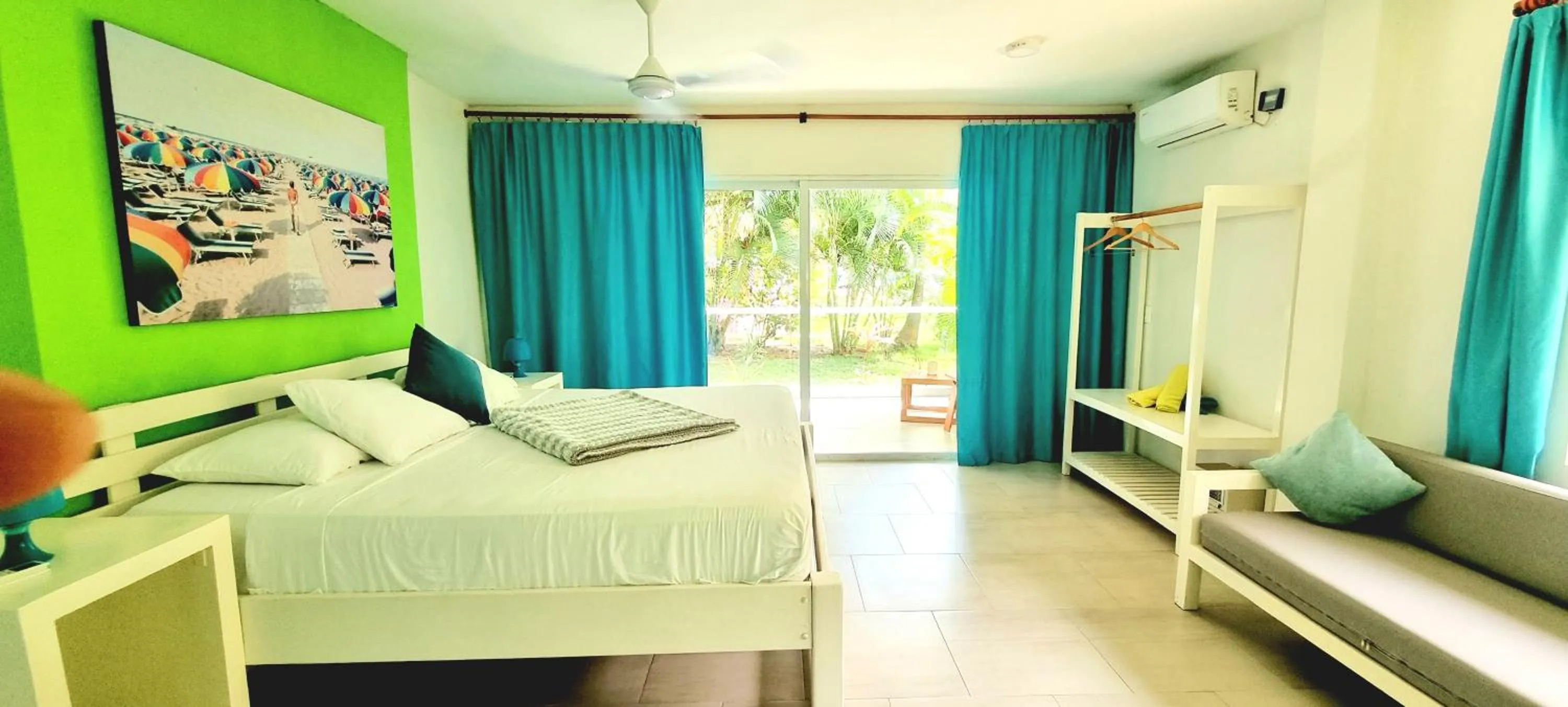 Living room, Bed in Blue Mango Beach Hotel