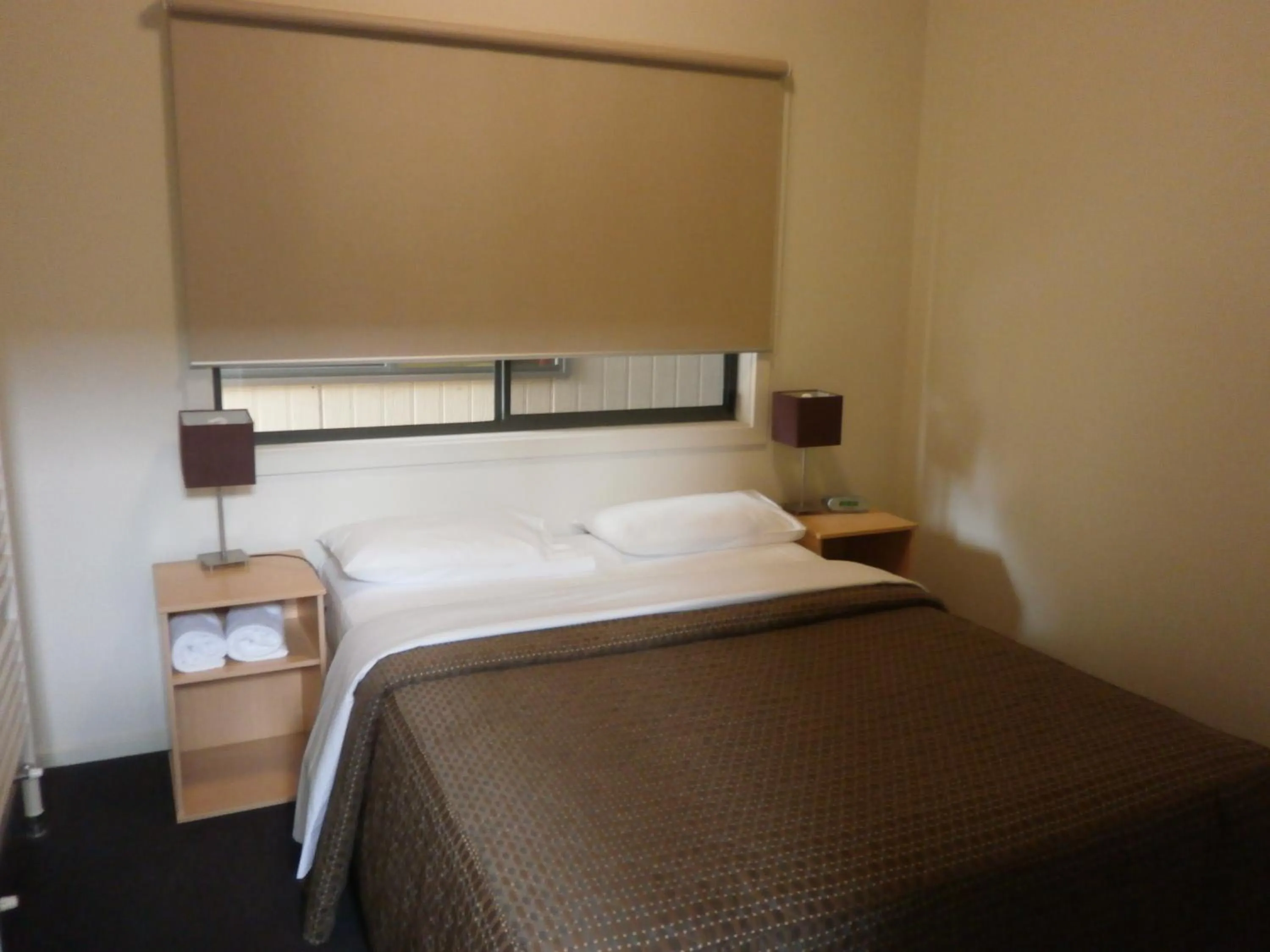 Bed in Sovereign Views Apartments