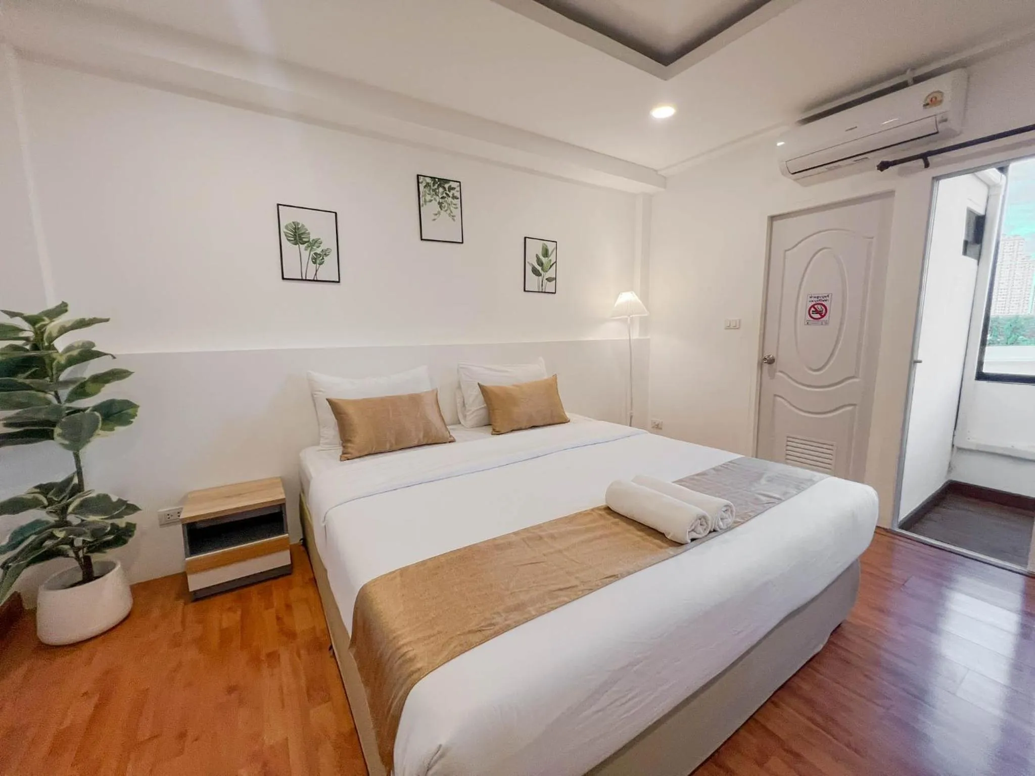 Bed in Inspire House Hotel