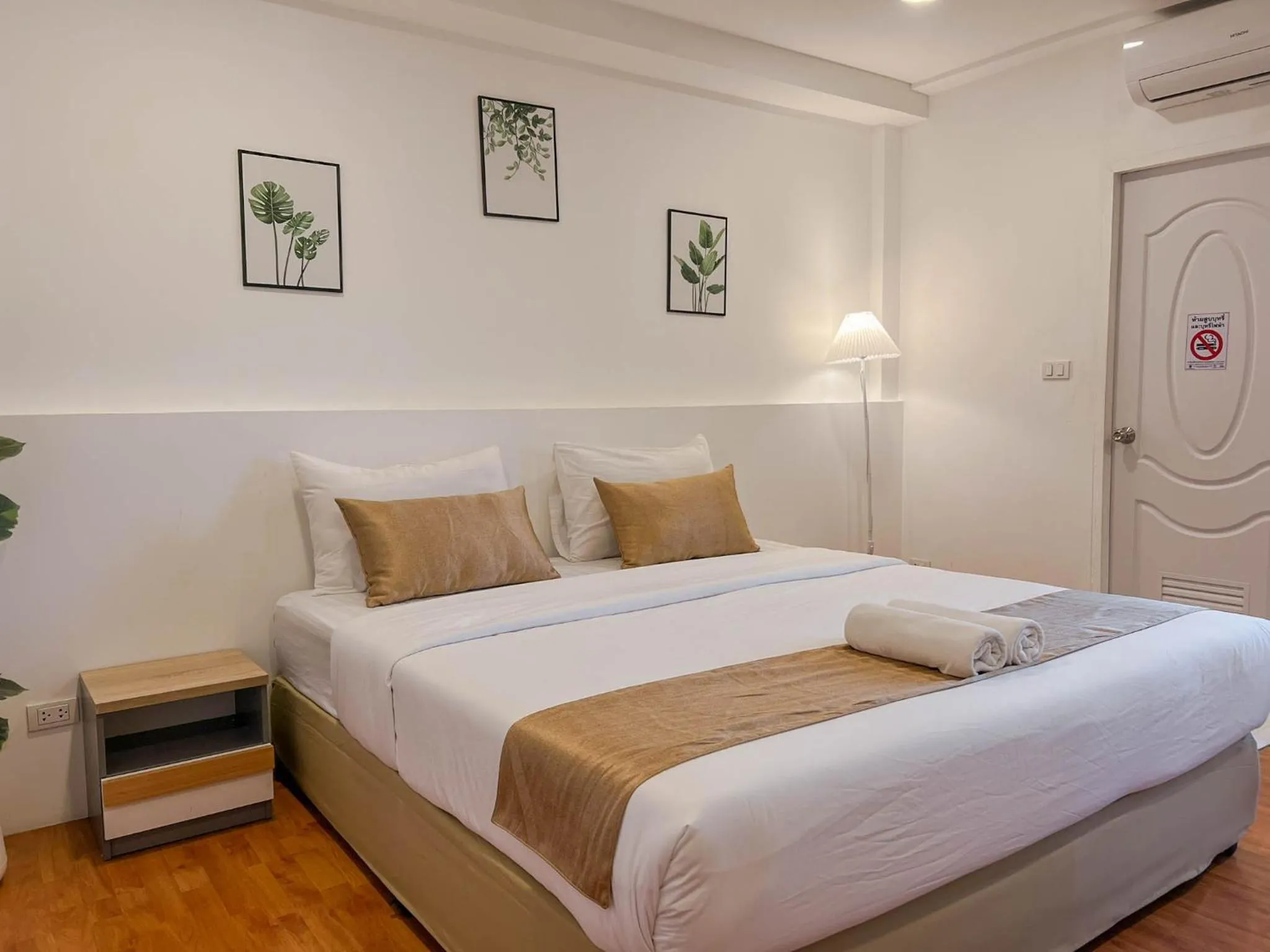 Bed in Inspire House Hotel