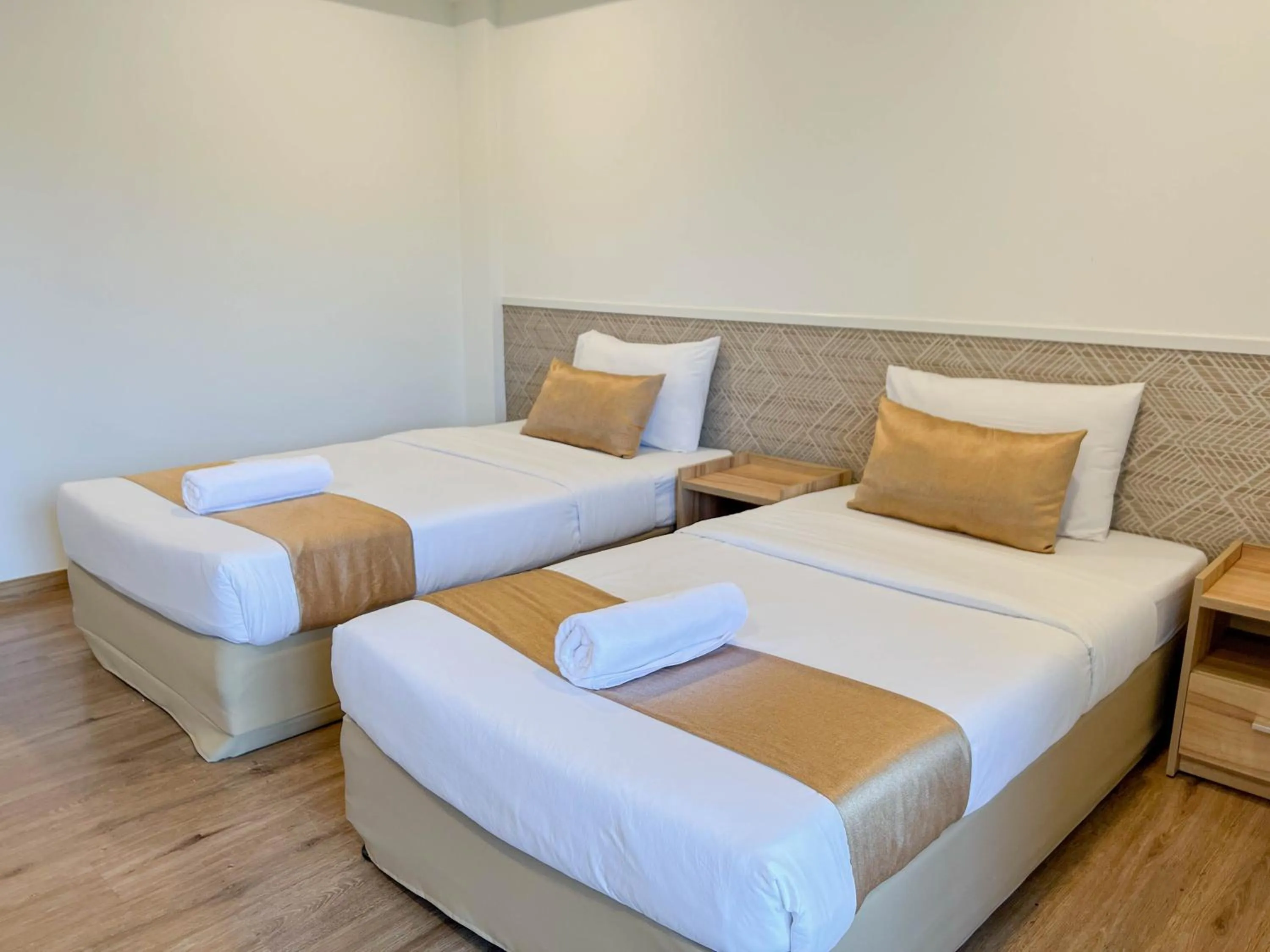 Bed in Inspire House Hotel