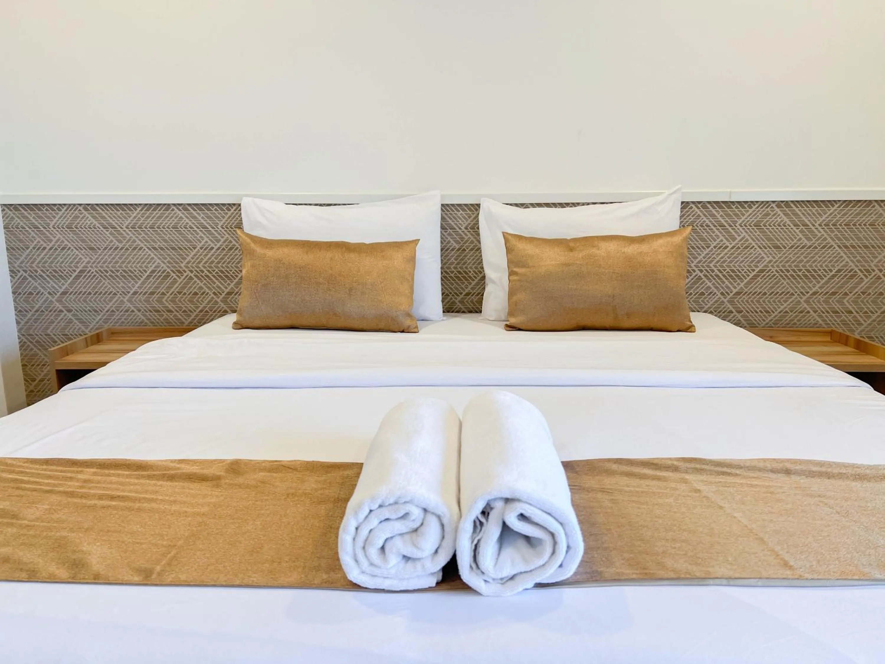 Bed in Inspire House Hotel