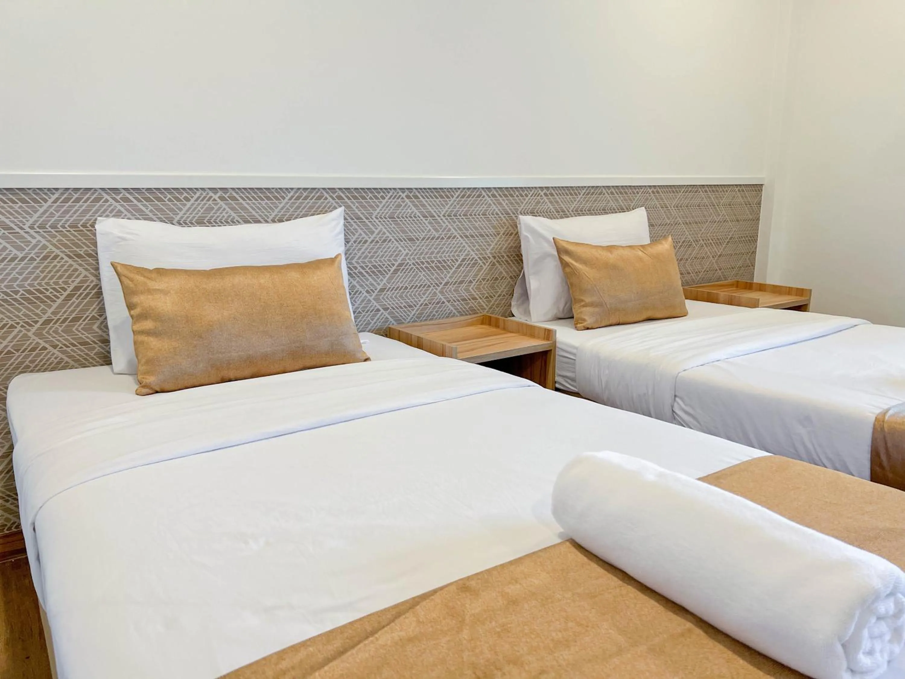 Bed in Inspire House Hotel