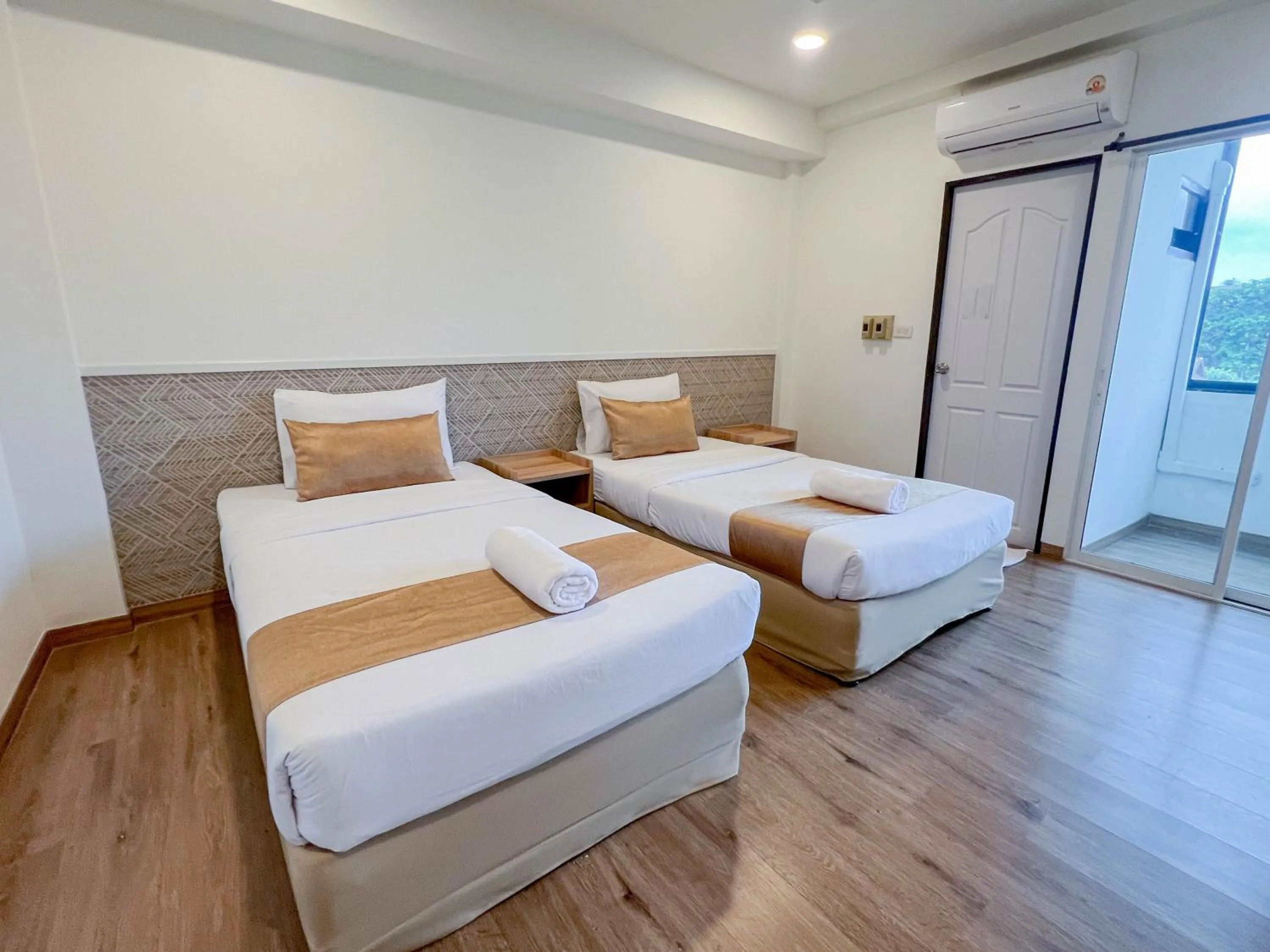 Bed in Inspire House Hotel