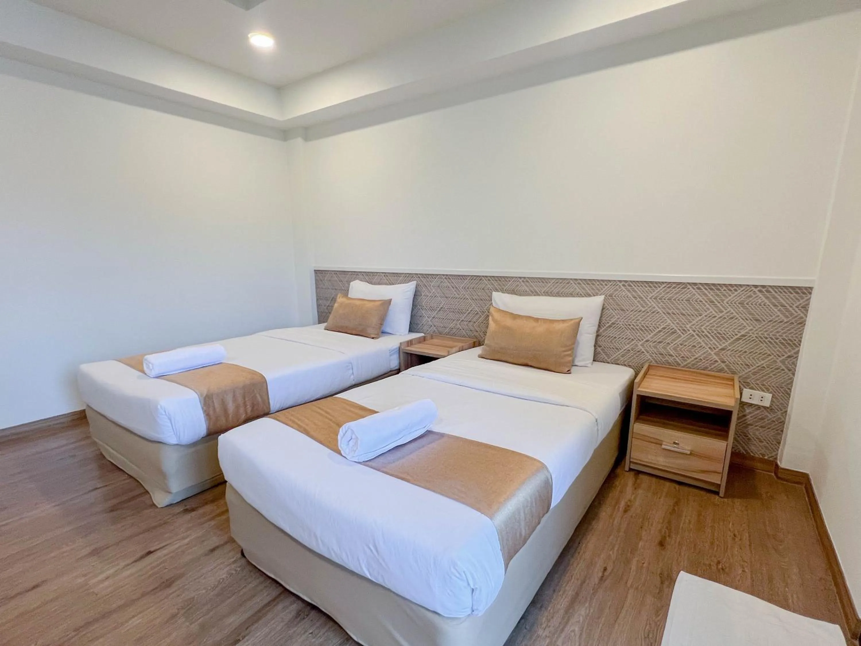 Bed in Inspire House Hotel