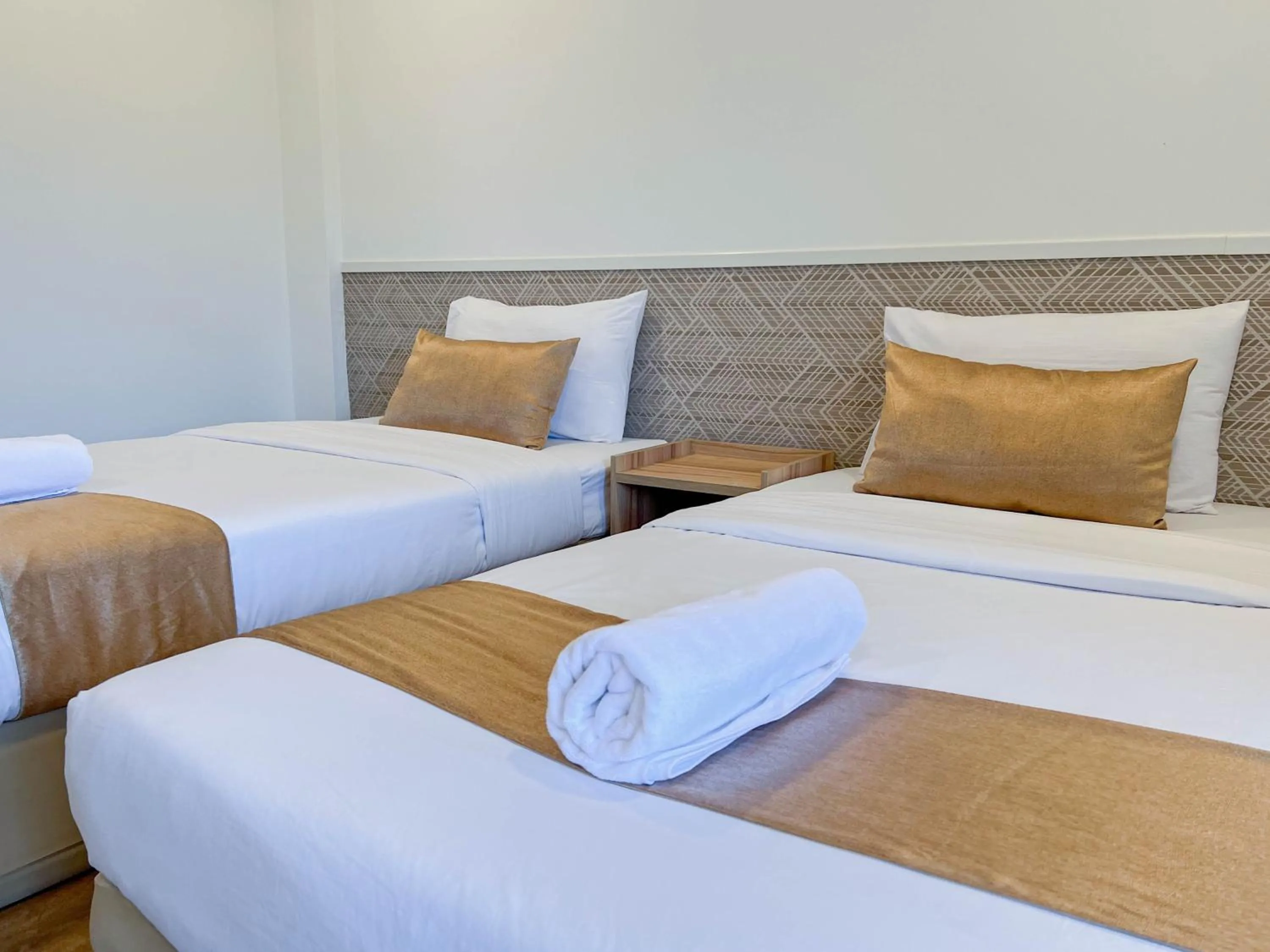 Bed in Inspire House Hotel