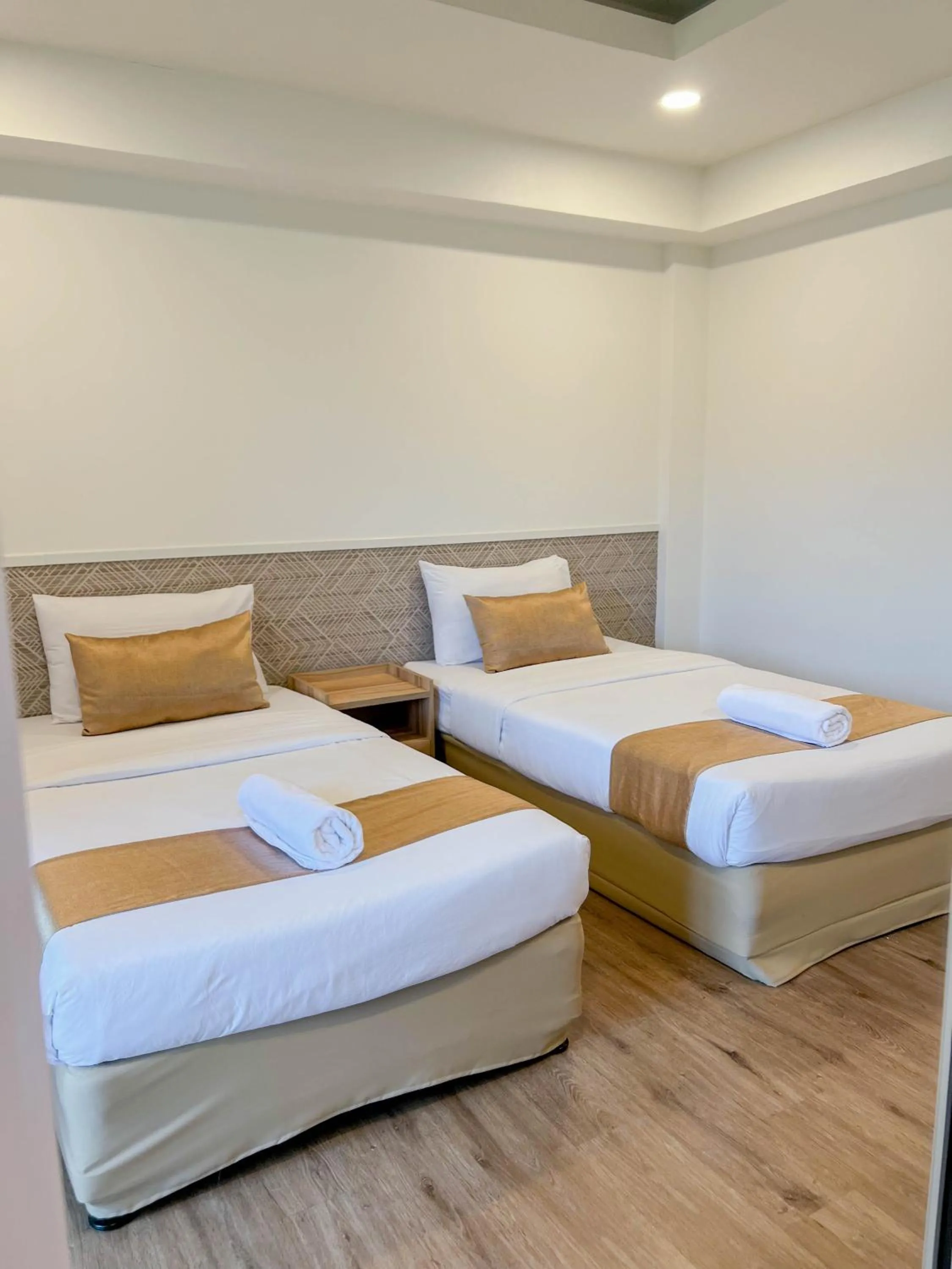 Bed in Inspire House Hotel