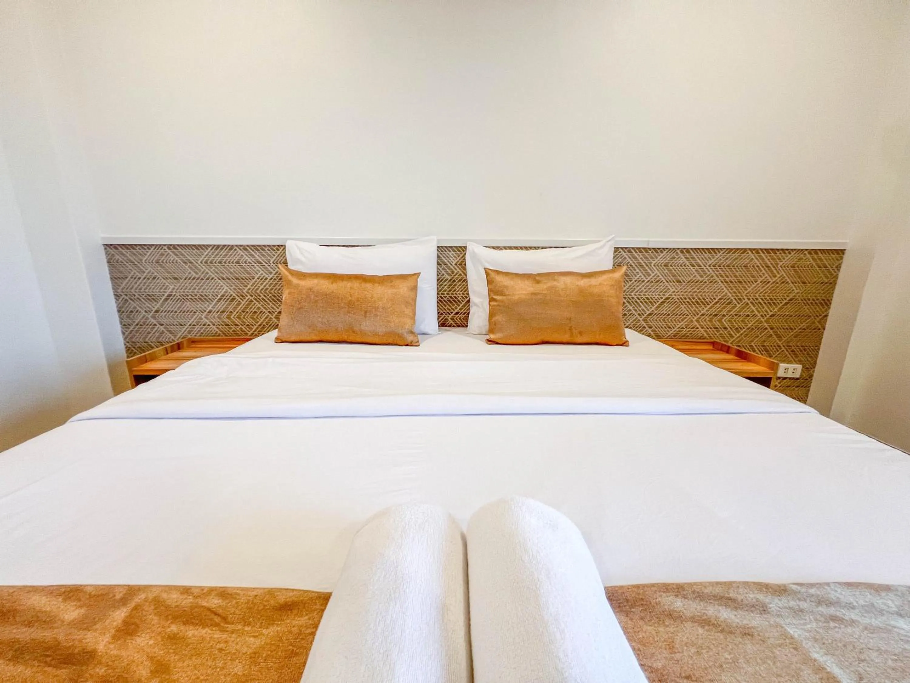 Bed in Inspire House Hotel