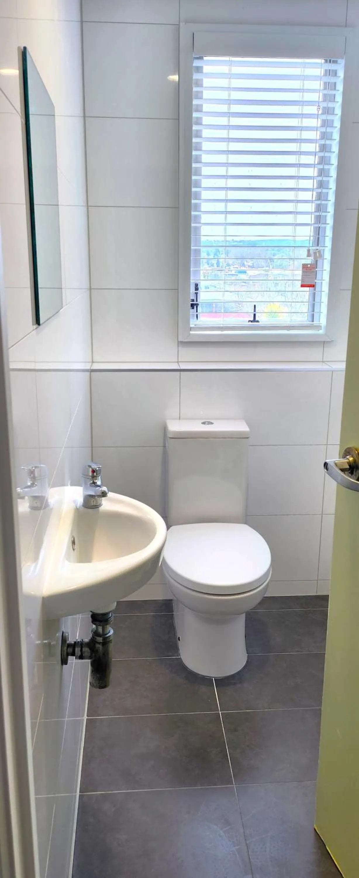 Toilet in Urban Lounge Sleepery, SureStay Collection by BW