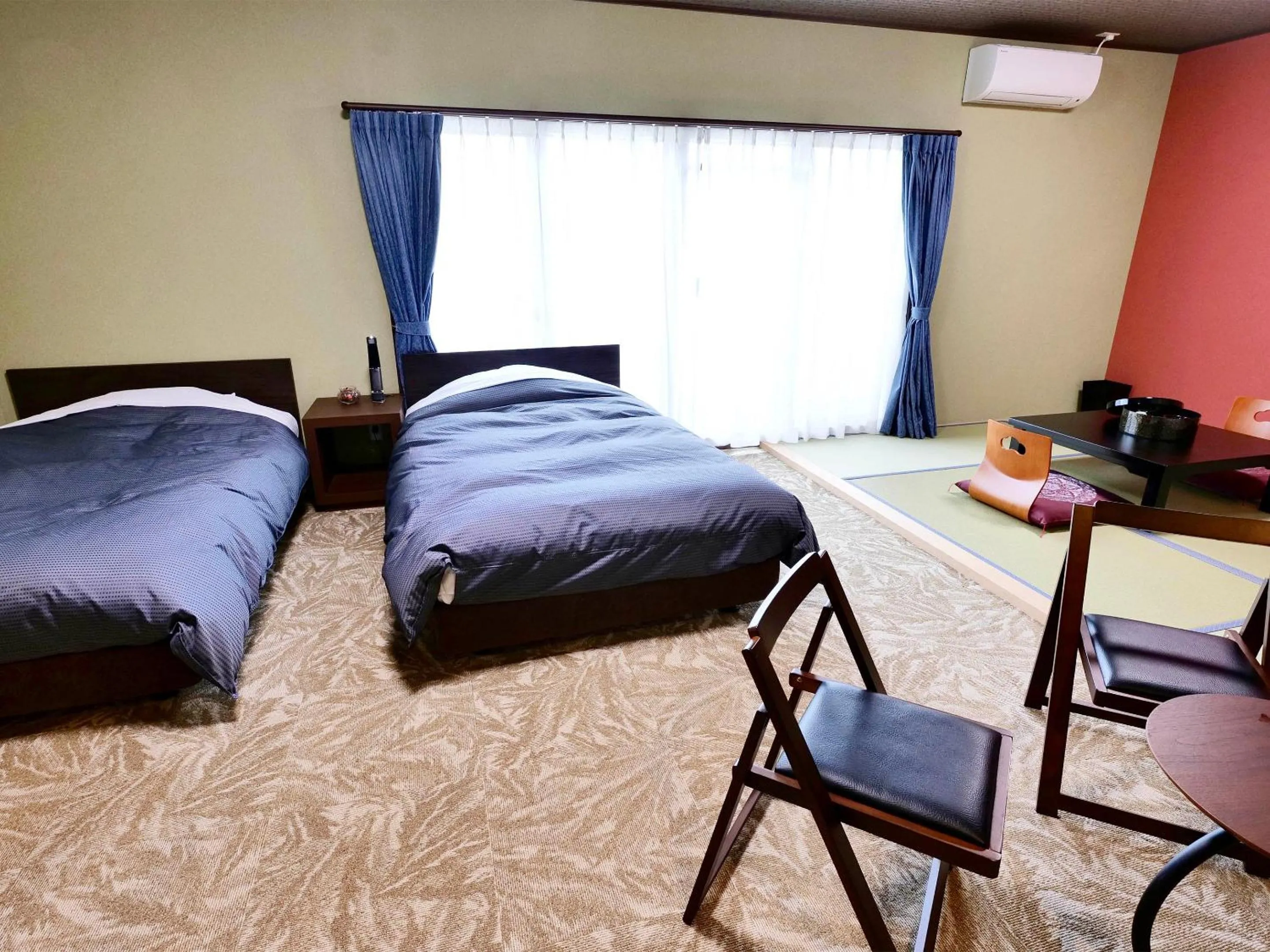 Bed in Apprising hotels GranJam Tsugaike