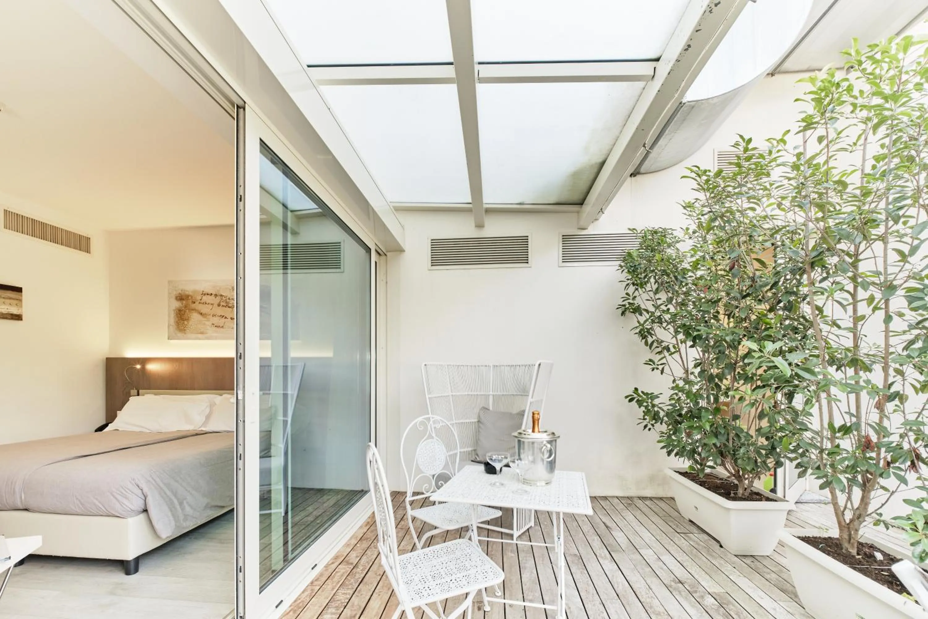 Patio, Bed in Seven Park Hotel Lake Como - Adults Only