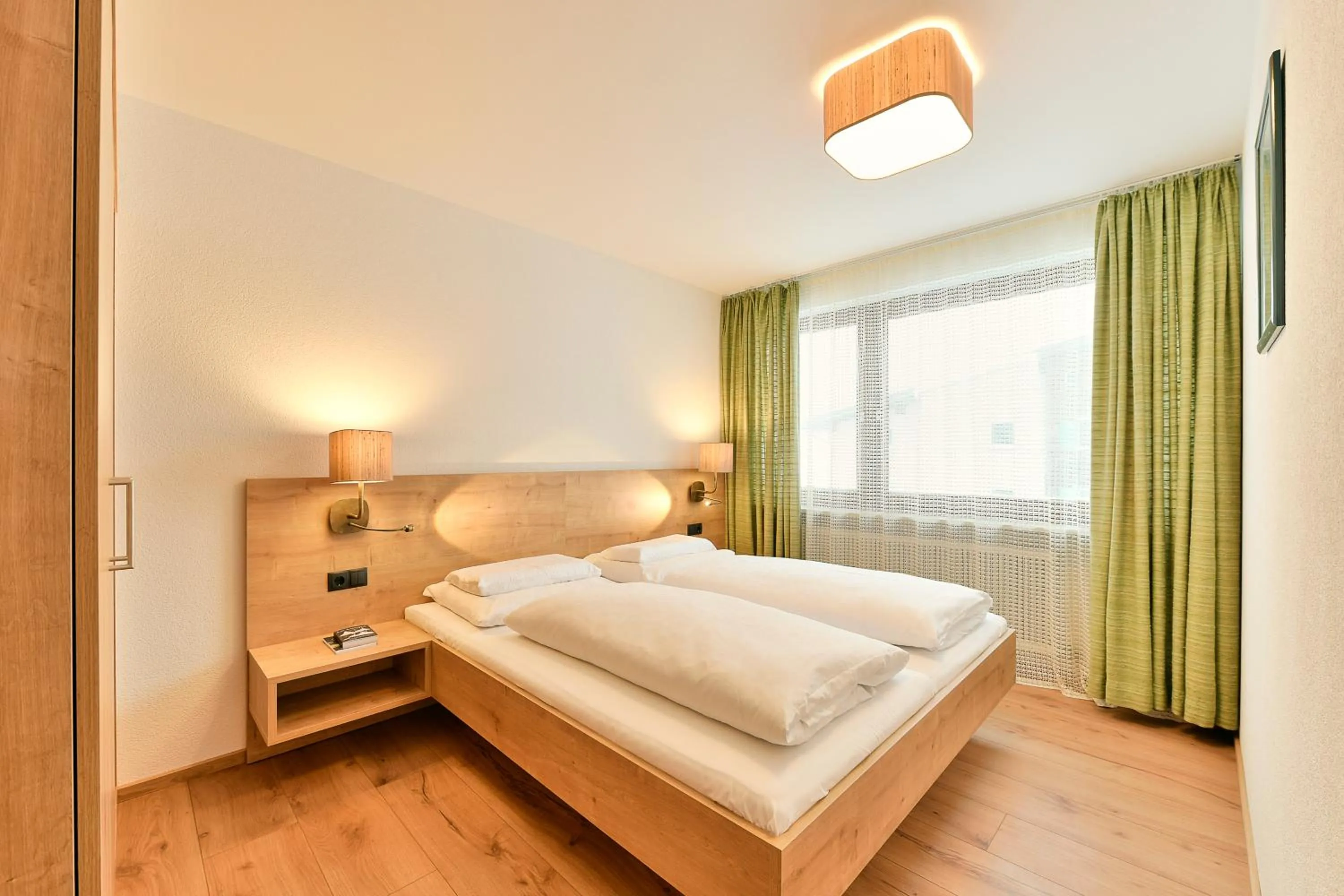 Bedroom, Bed in Hotel Bergheim