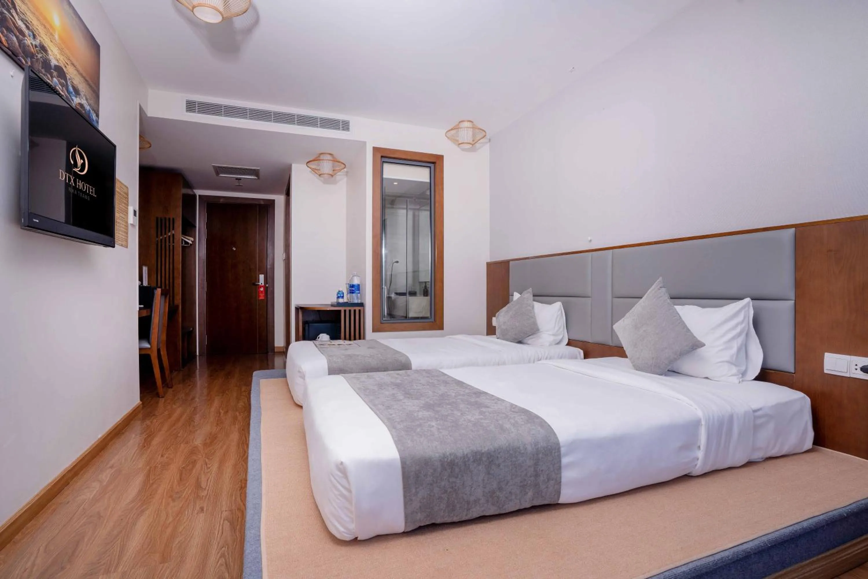 Bed in DTX Hotel Nha Trang