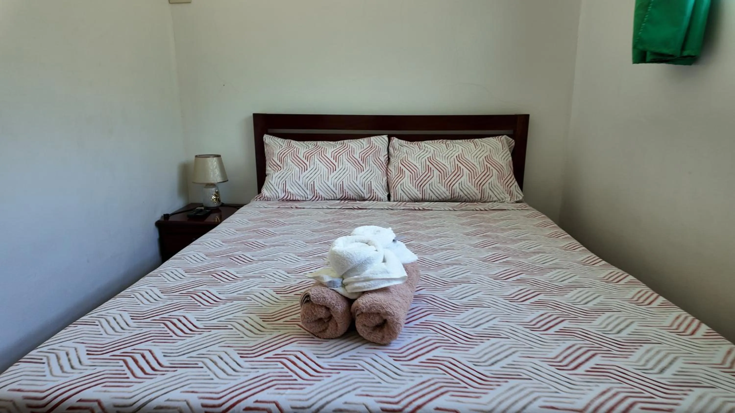 Bed in Tongatok Cliff Resort