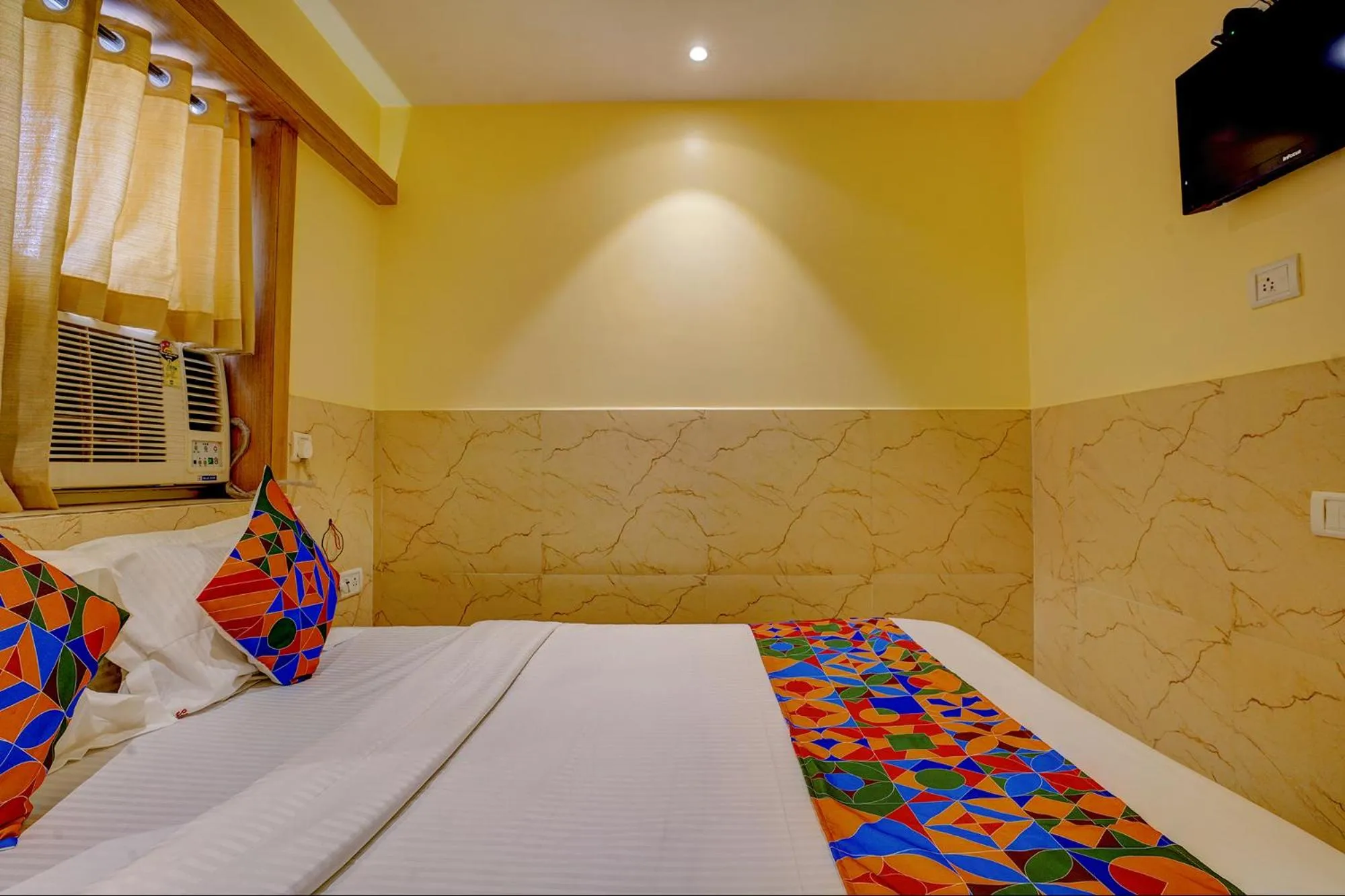 Bed in FabHotel Starwood Residency - 100M From Dr DY Patil Stadium
